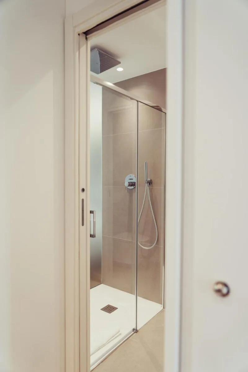 Shower in Marina Gardens Boutique&Suites