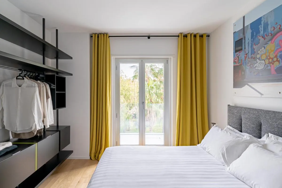 Bed in Marina Gardens Boutique&Suites