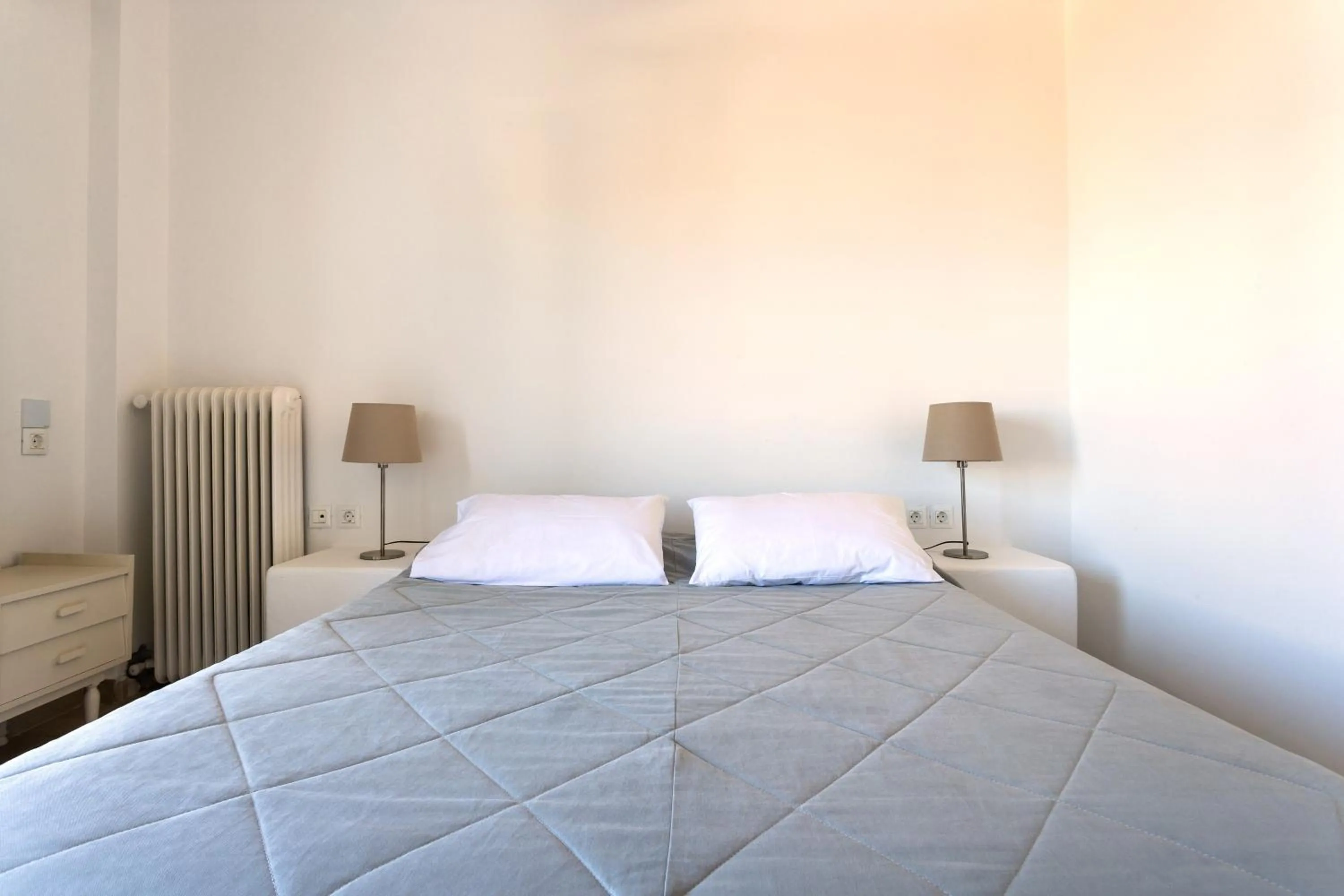 Bed in Hotel Roumani