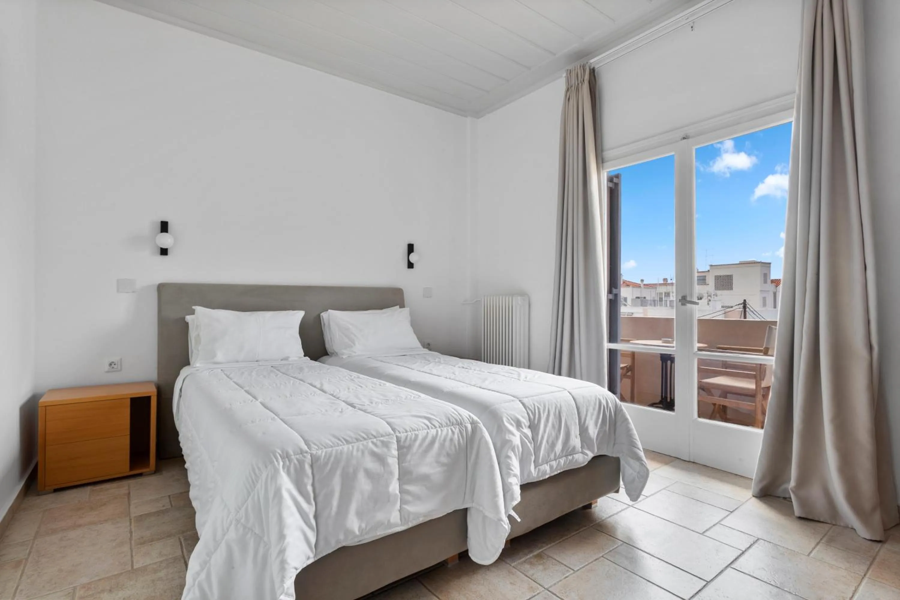 Bed in Hotel Roumani