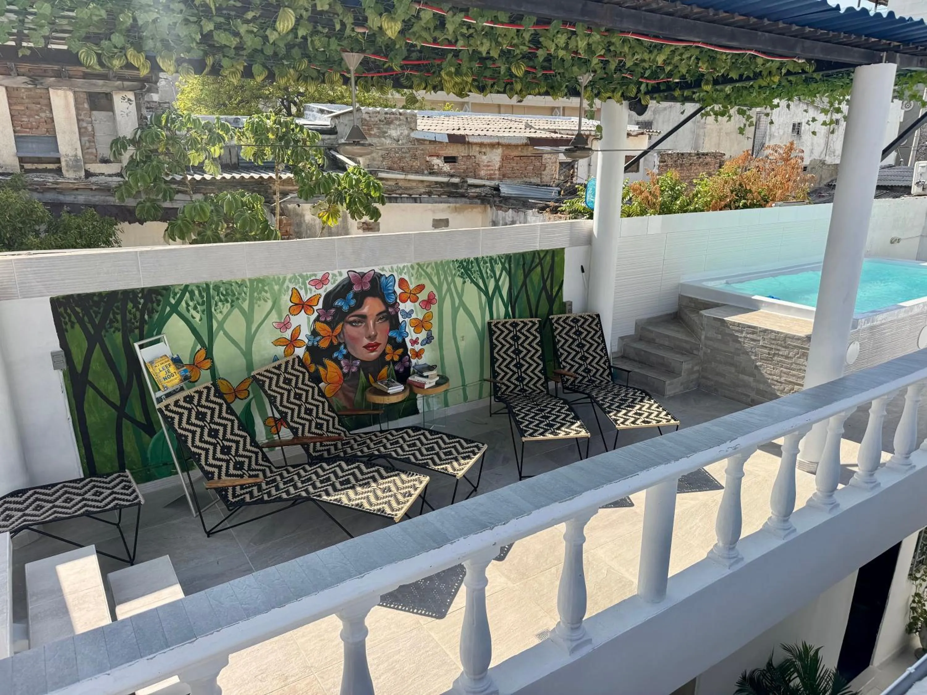 Swimming pool in Comunidad Calle 13 Hotel Boutique