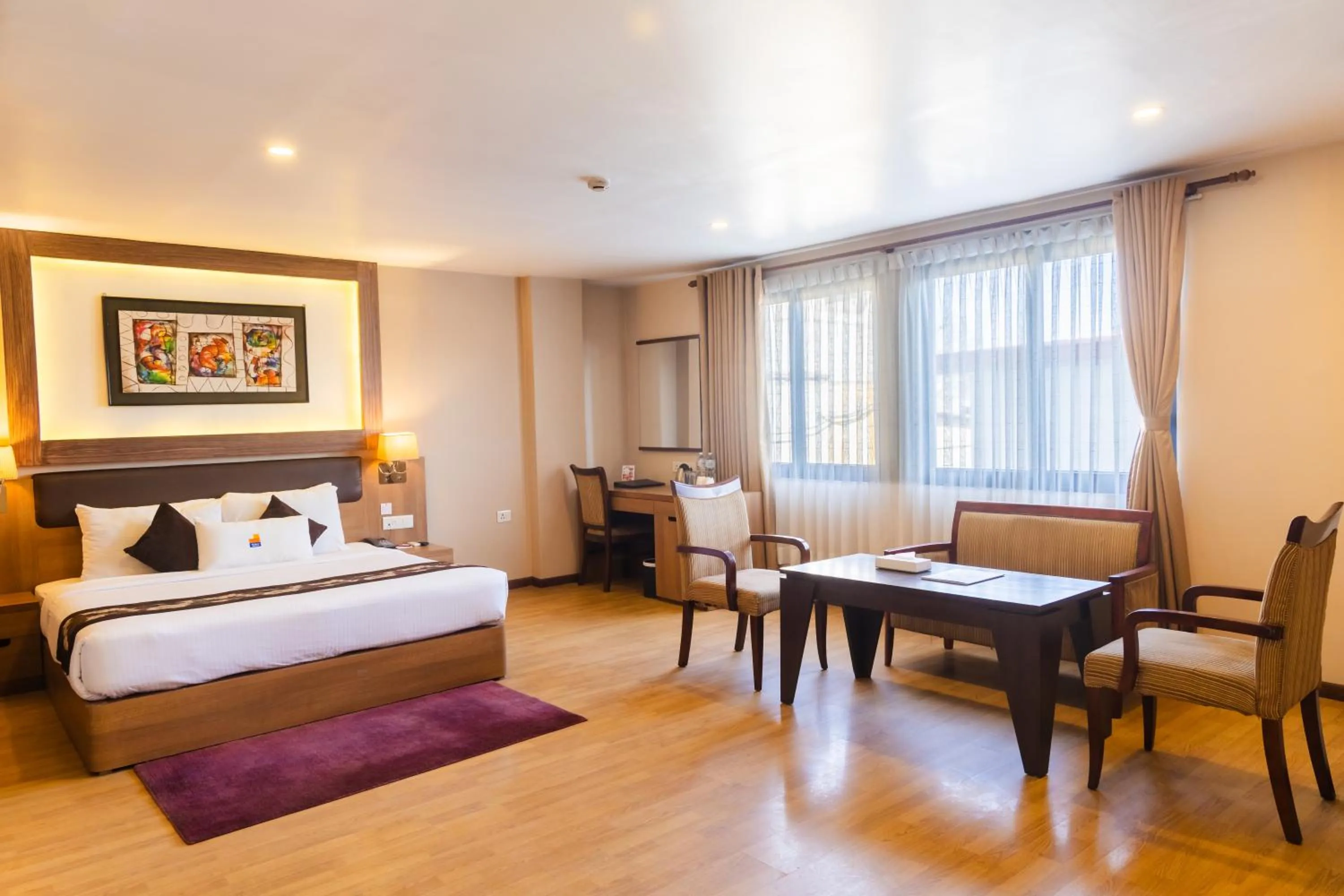 Bed in Hotel Mirage Regency