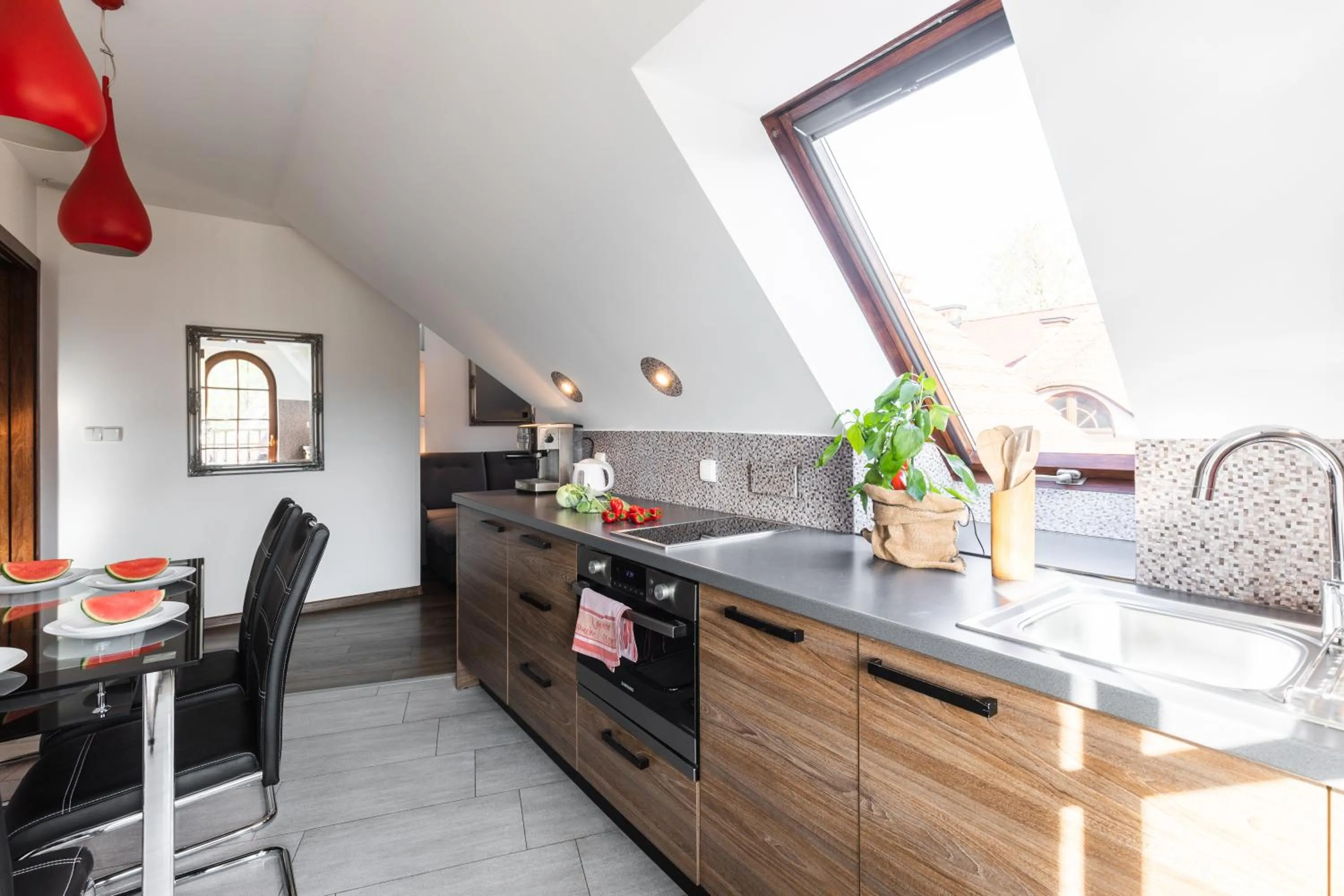 Kitchen or kitchenette in ApartHost Rezydencja Sienkiewicza