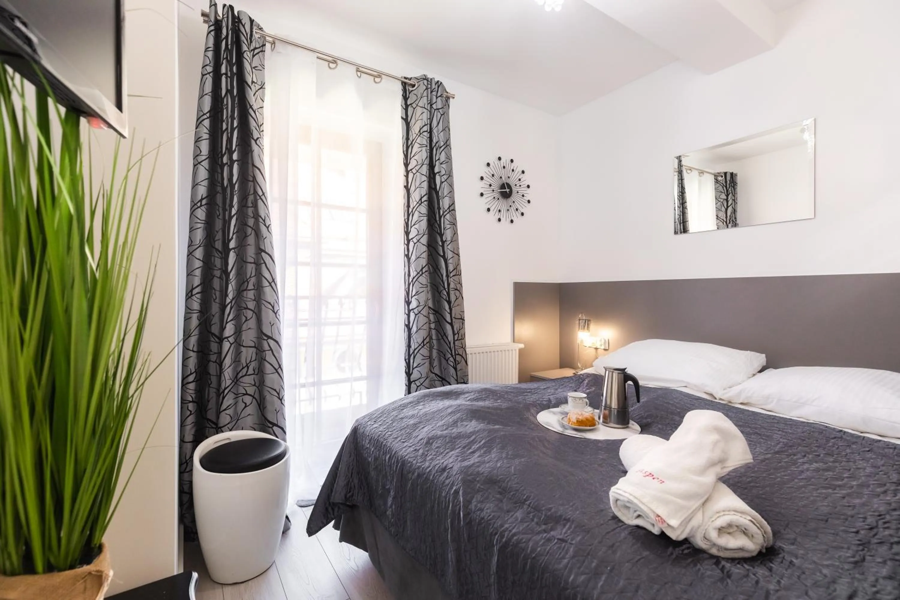 Bed in ApartHost Rezydencja Sienkiewicza