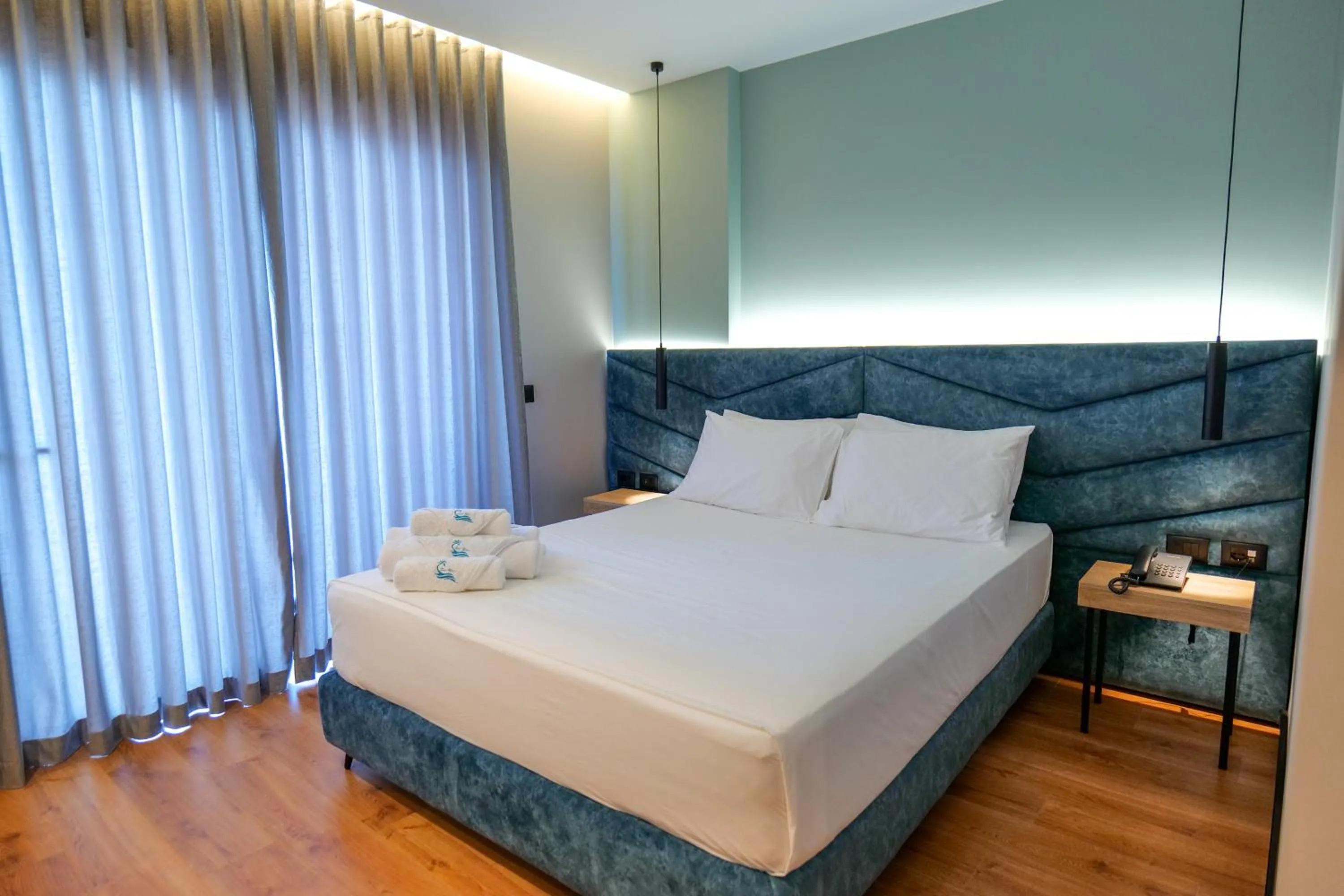 Bed in Seawave Hotel