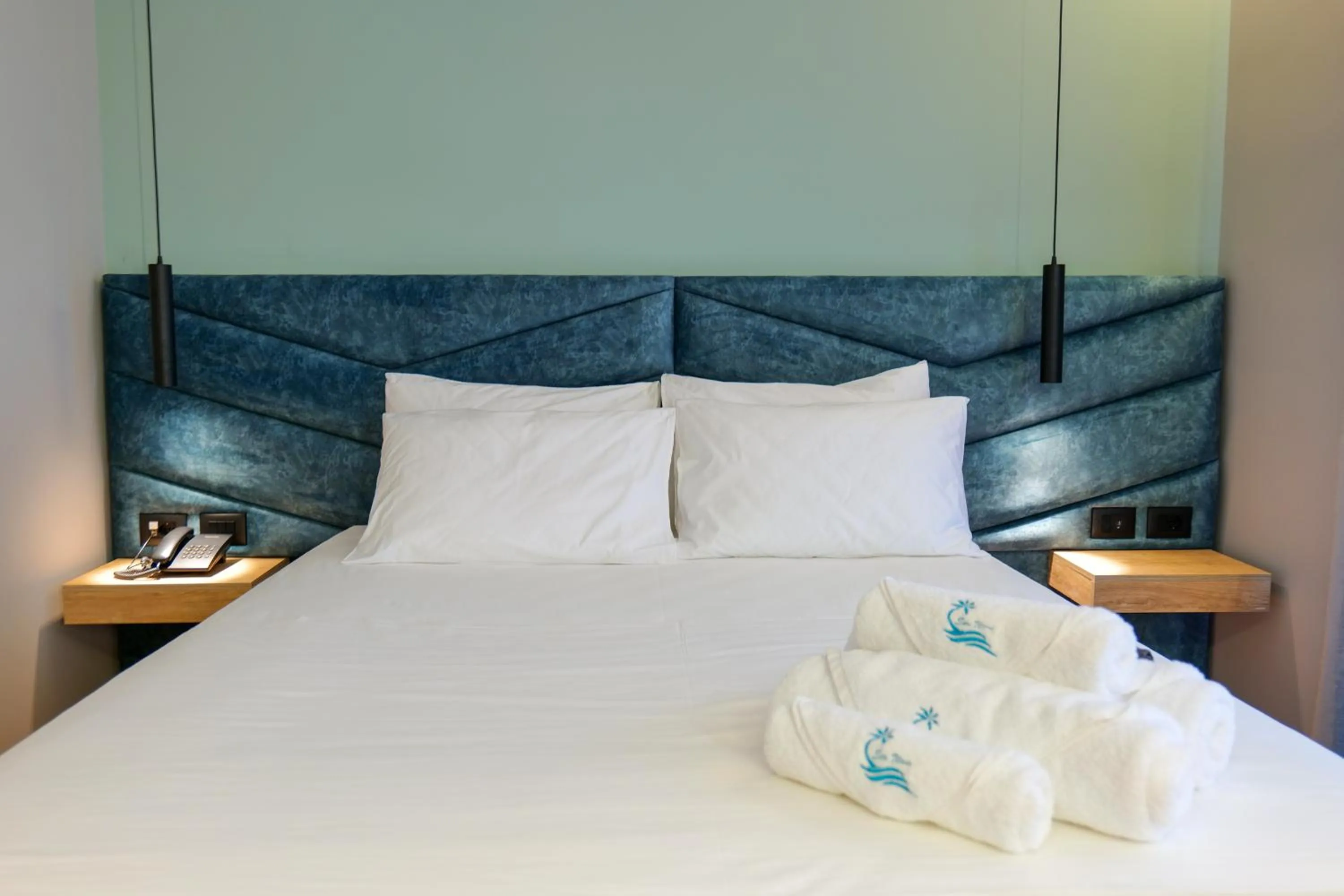 Bed in Seawave Hotel