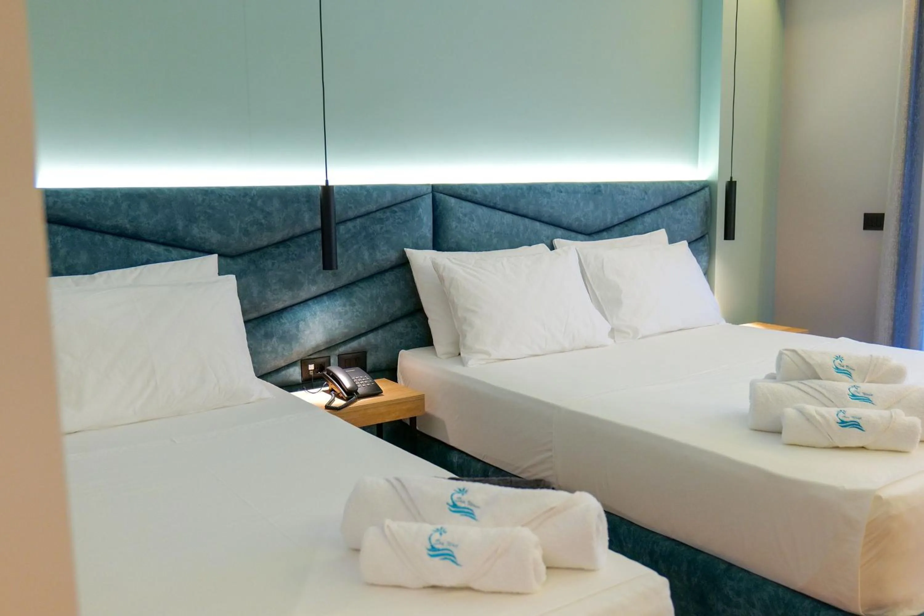 Bed in Seawave Hotel