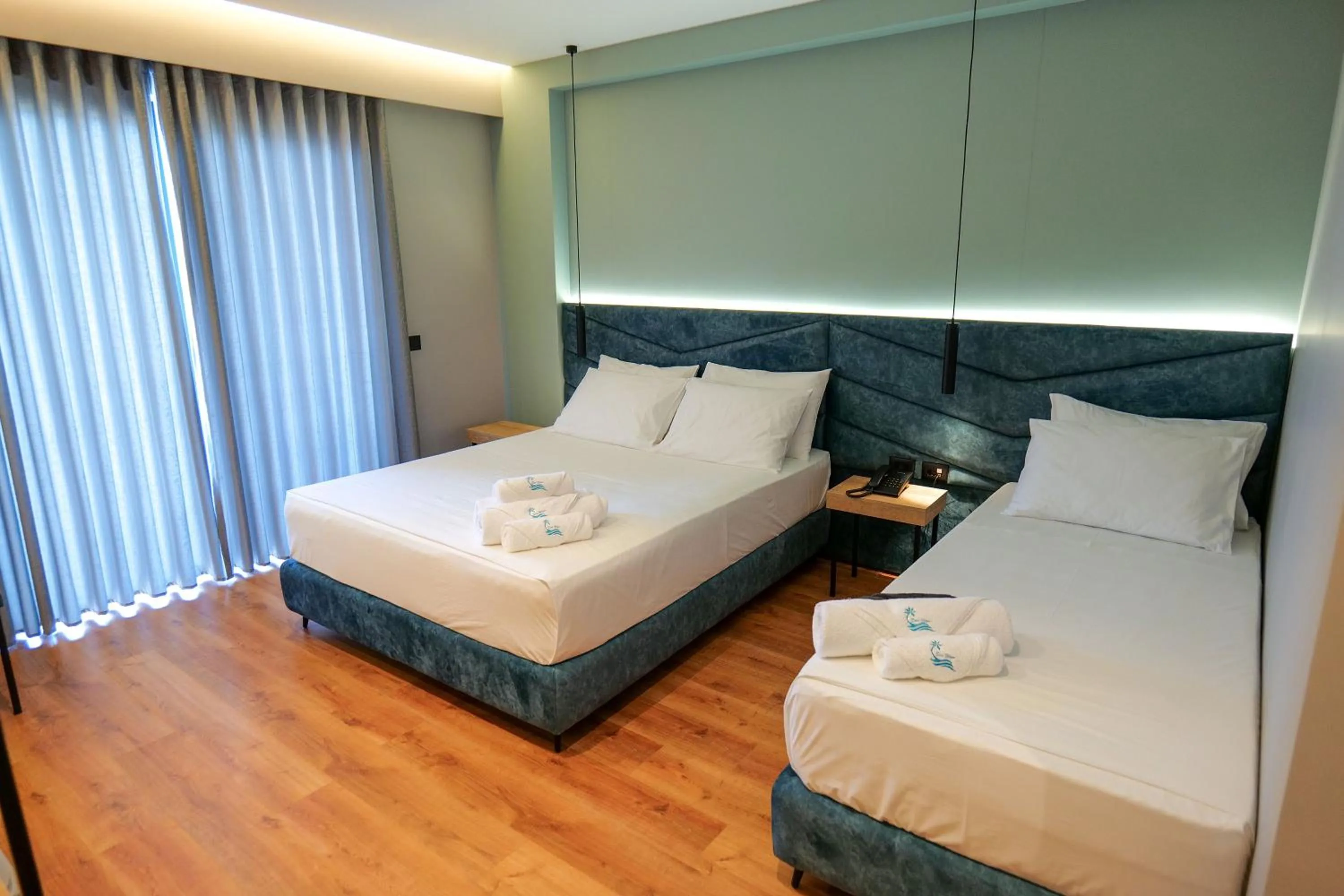 Bed in Seawave Hotel