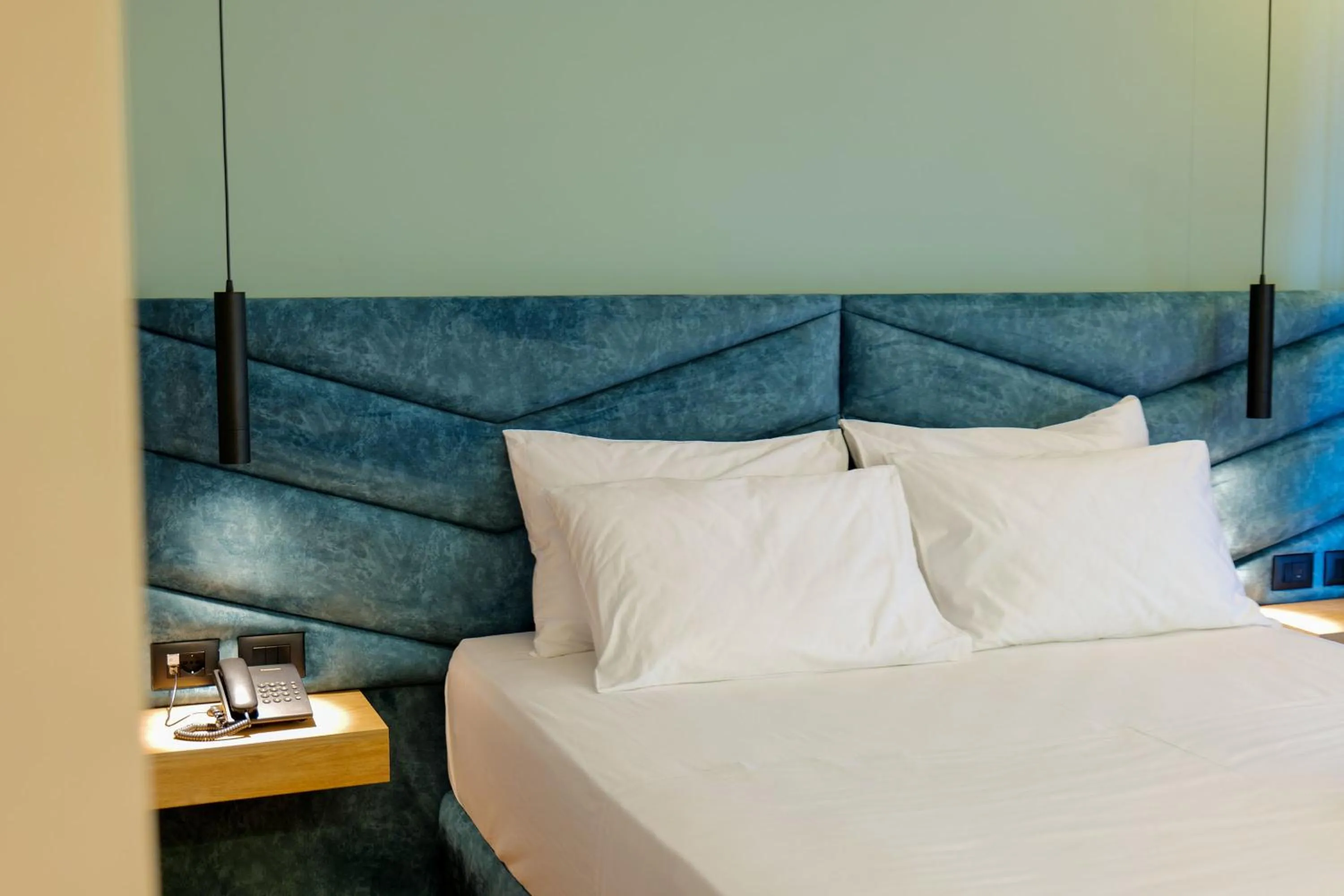 Bed in Seawave Hotel