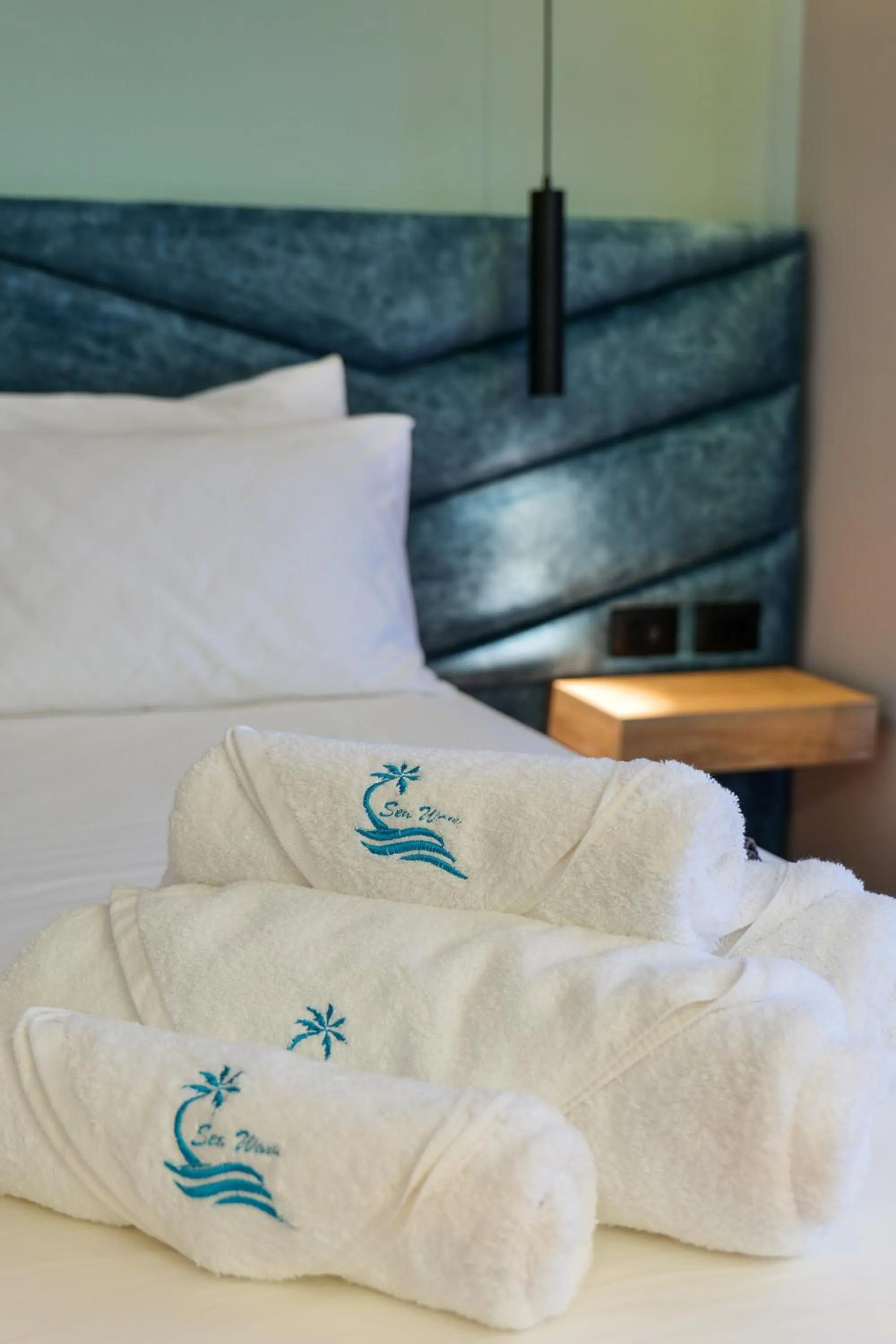 Bed in Seawave Hotel