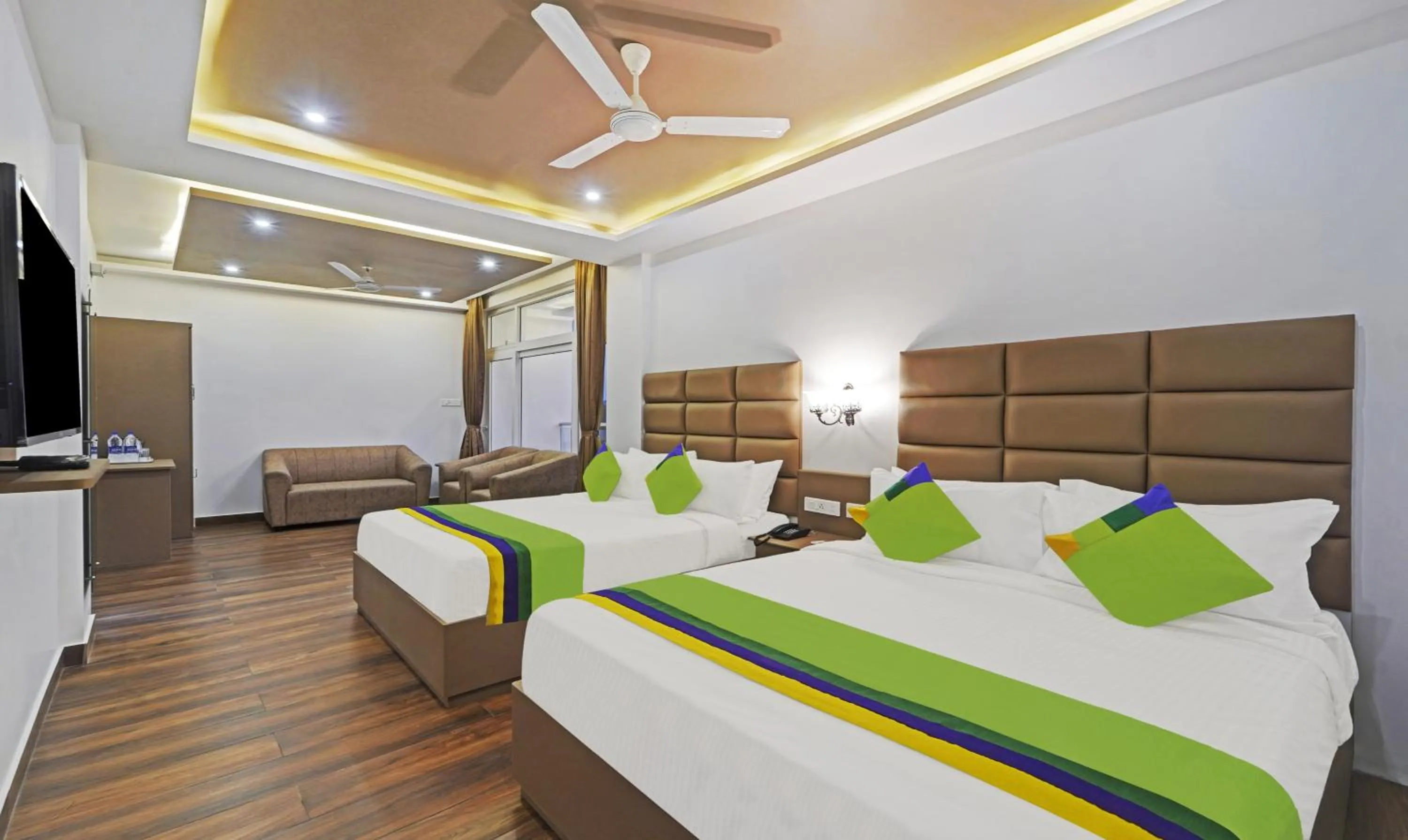 Bed in Treebo Premium Raffis' Andalusia Bay Way