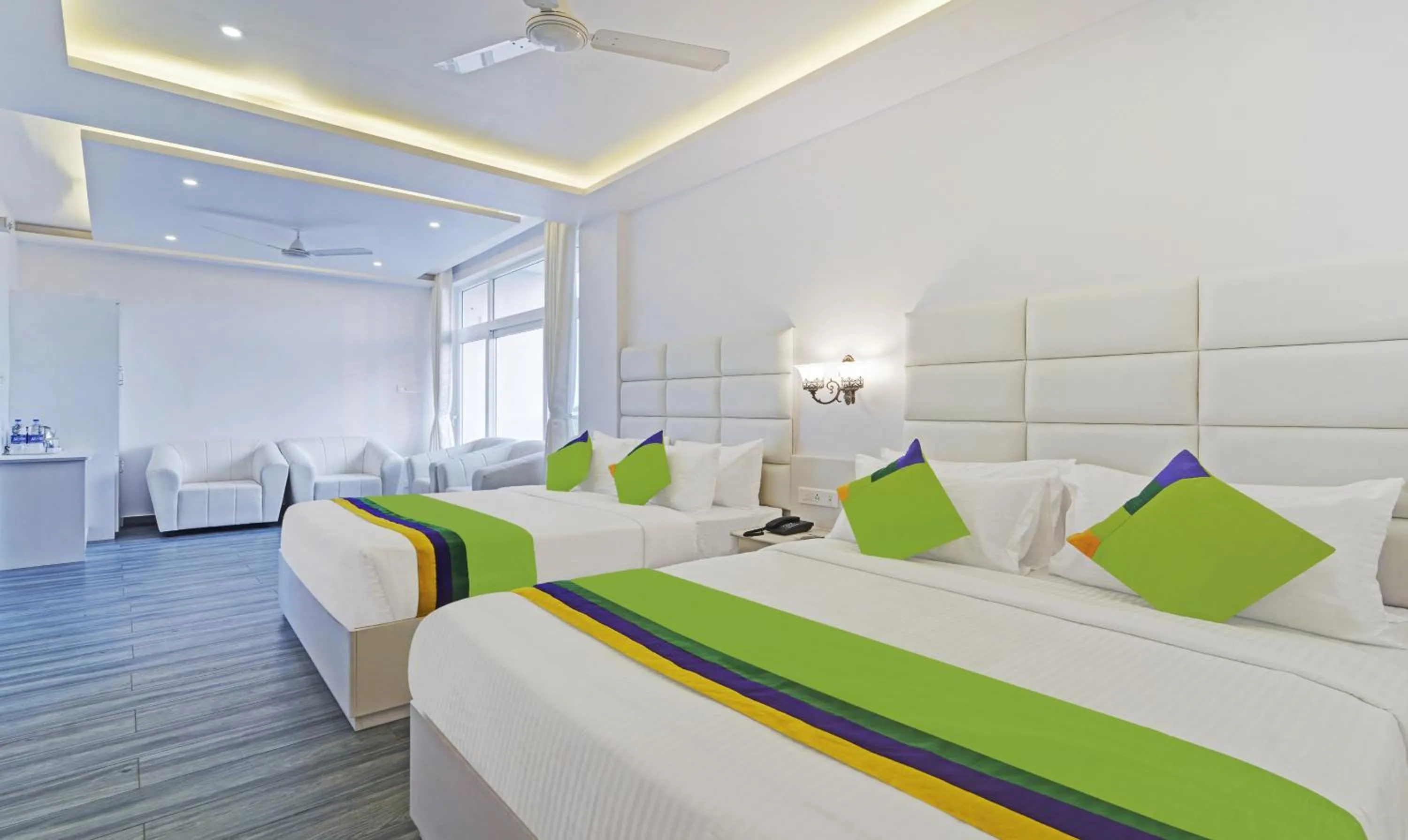 Bed in Treebo Premium Raffis' Andalusia Bay Way