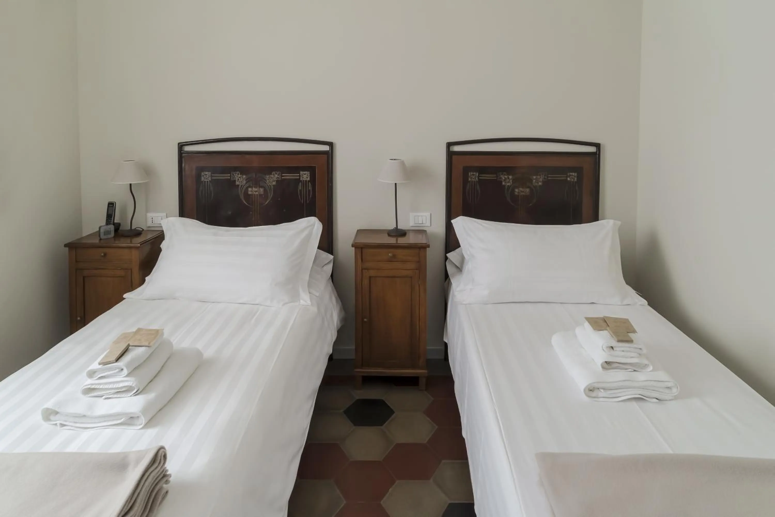 Decorative detail, Bed in Locanda San Bernardo