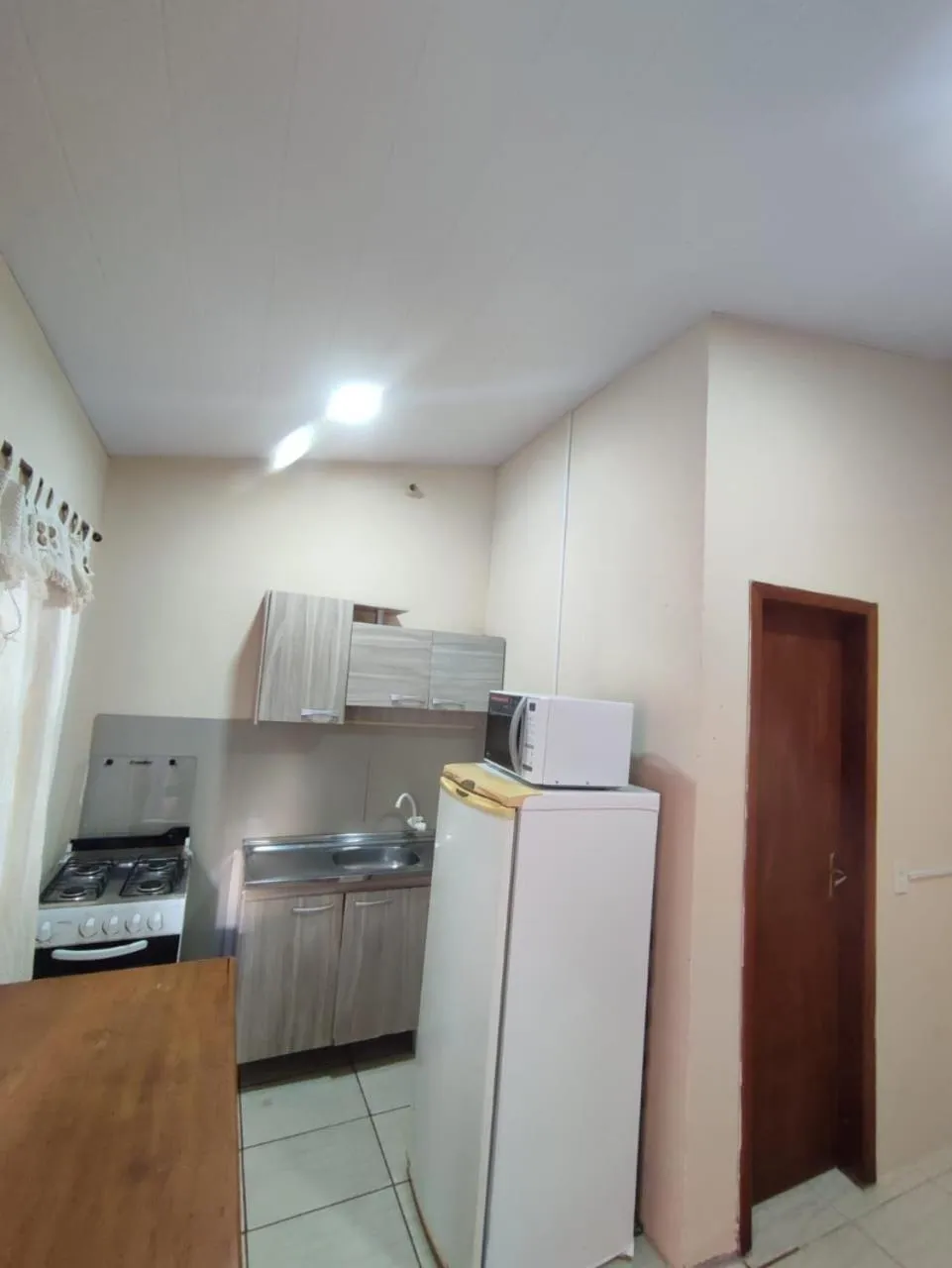 Kitchen or kitchenette in Apart da Cachoeira