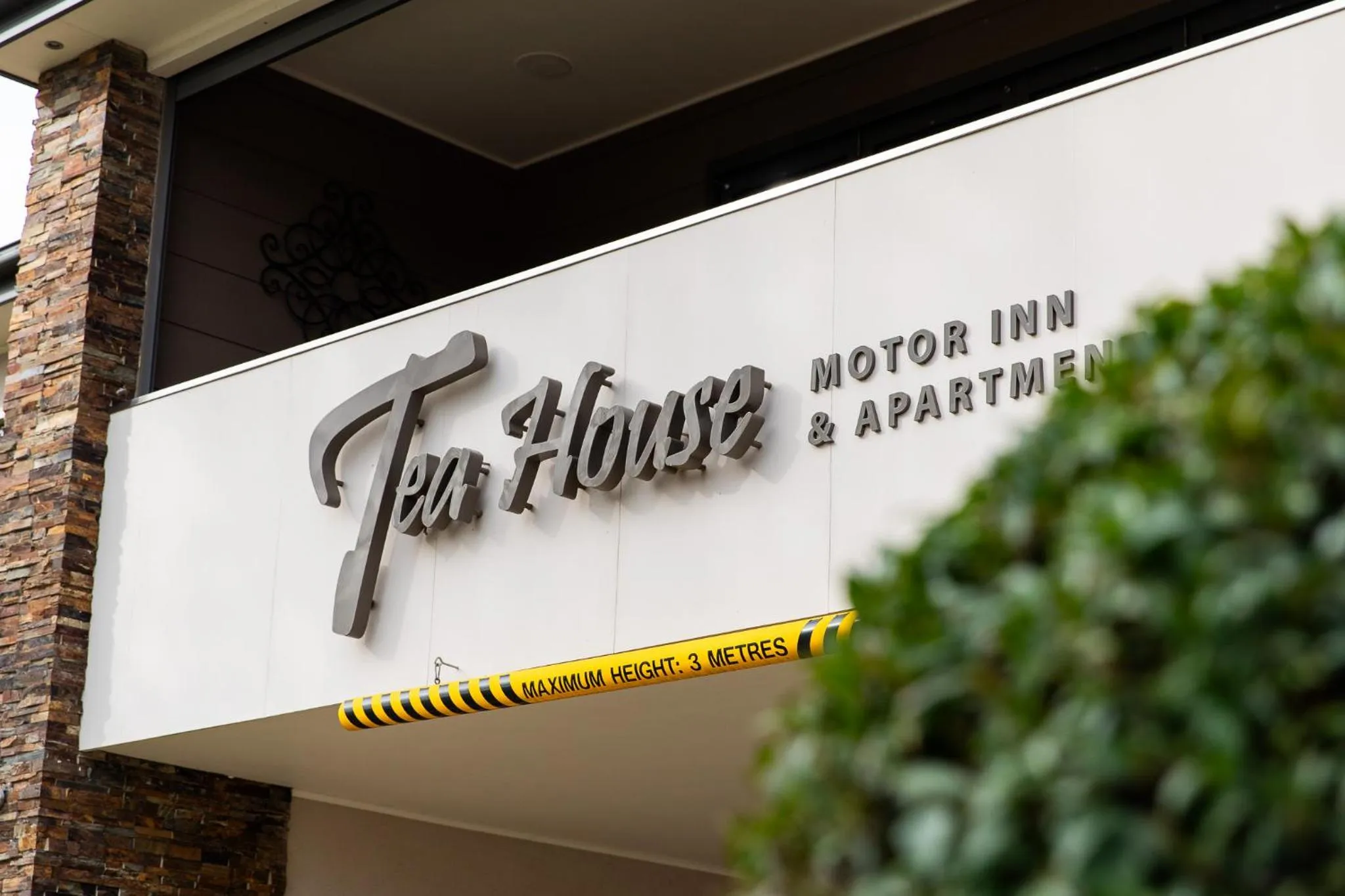Property logo or sign in Tea House Motor Inn