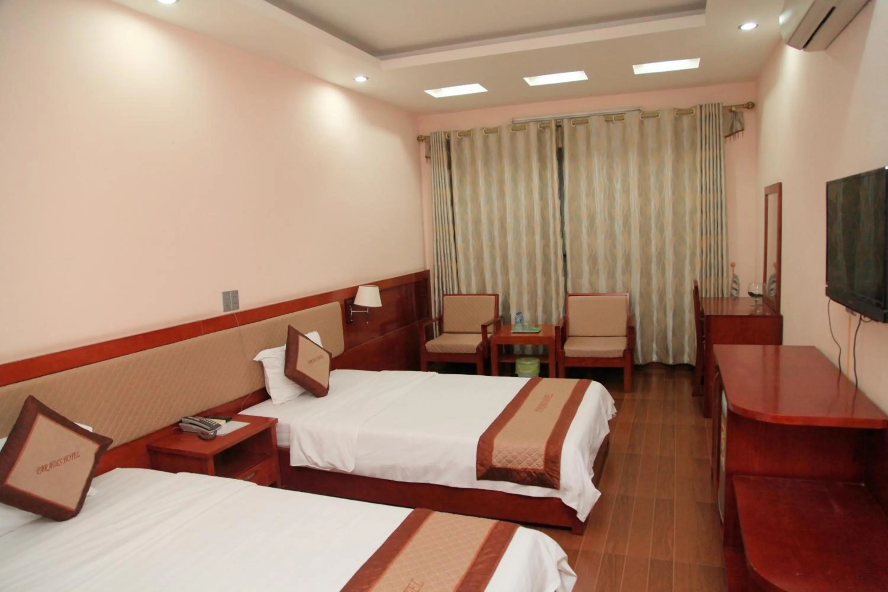 Bed in Paradis Hotel