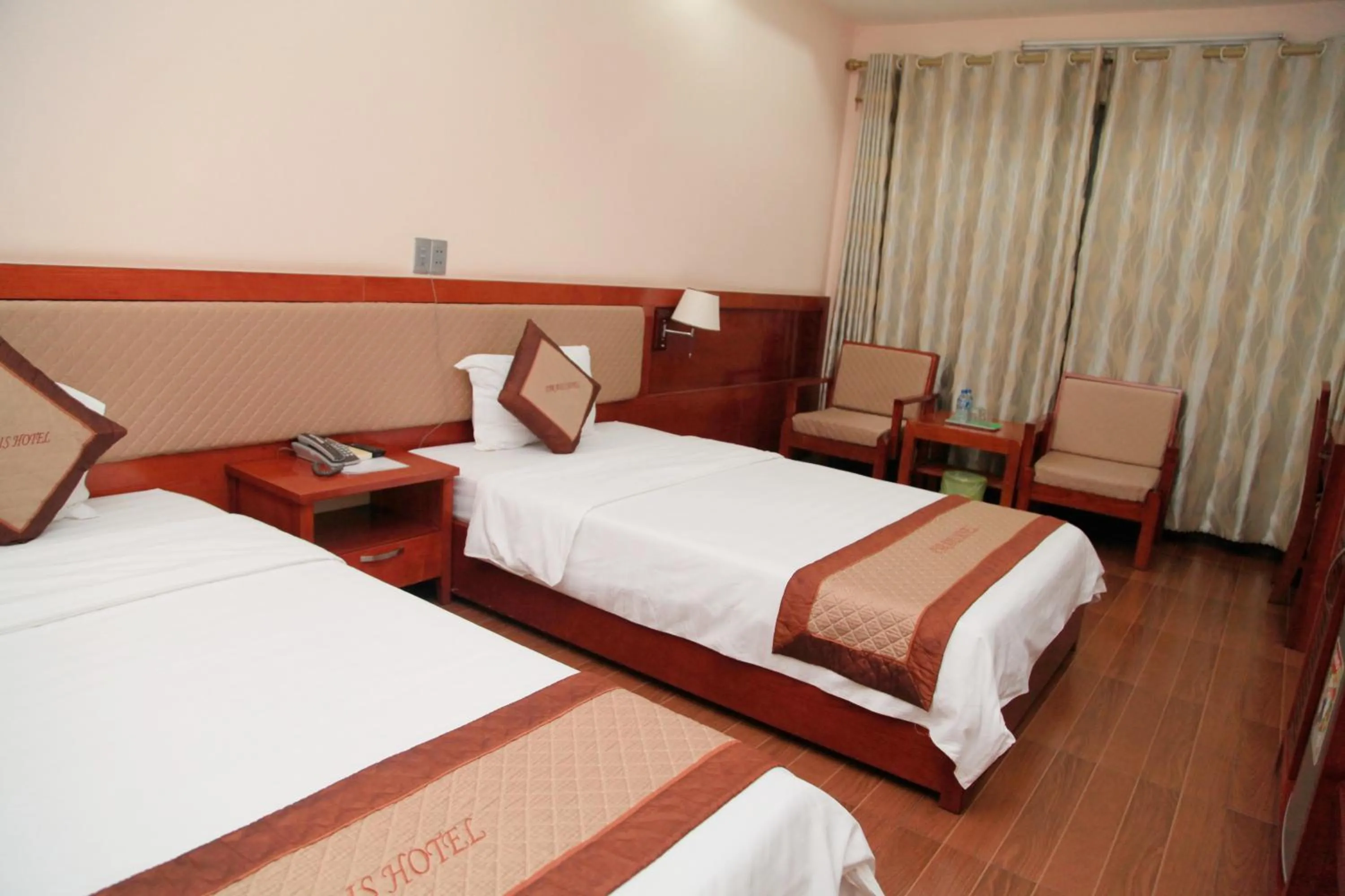 Bed in Paradis Hotel