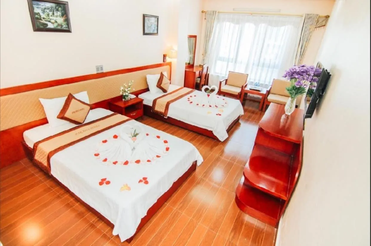 Bed in Paradis Hotel