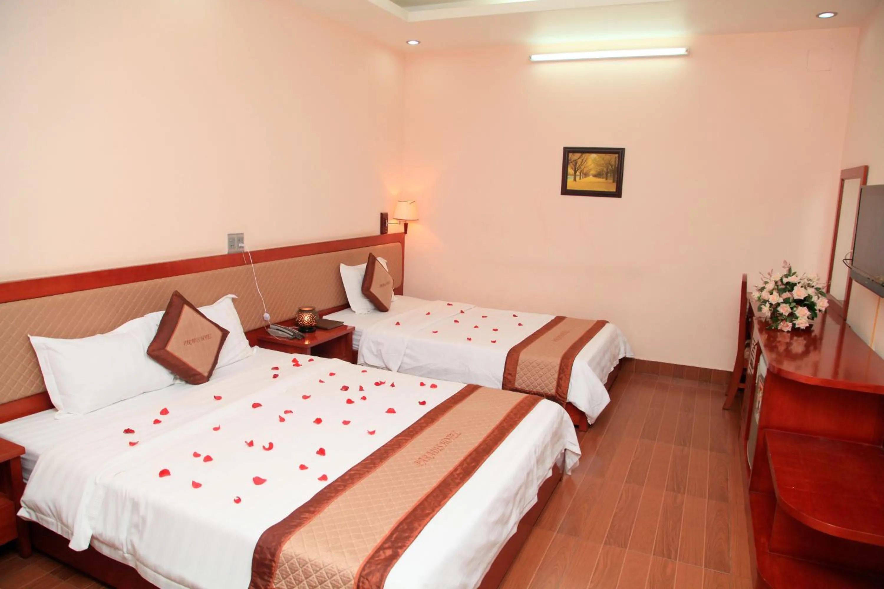 Bed in Paradis Hotel