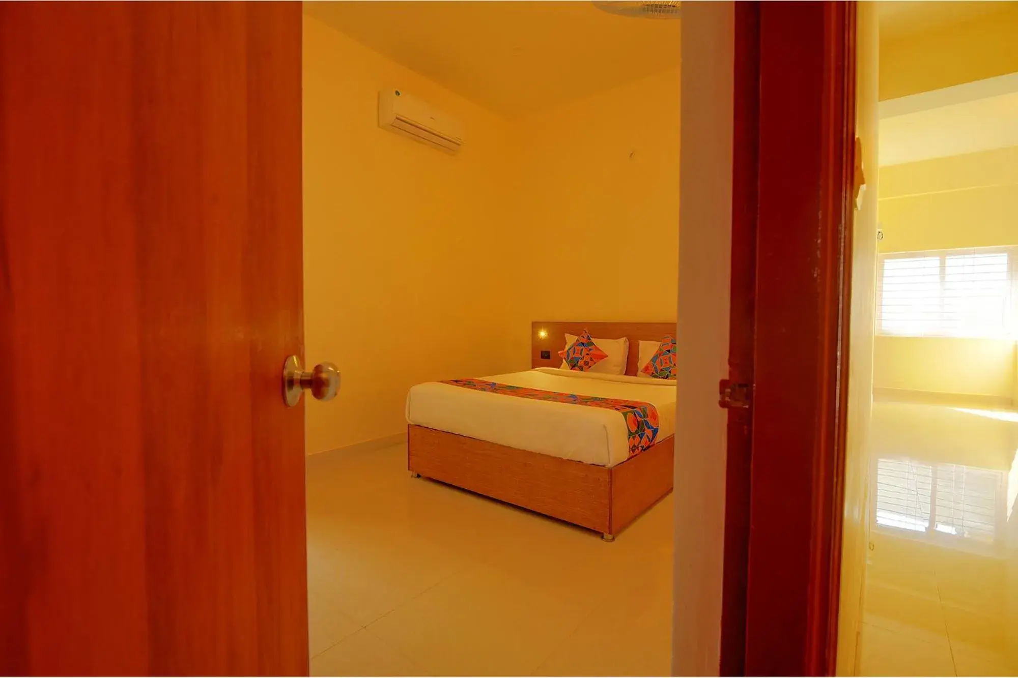 Photo of the whole room, Bed in FabHotel GR Lake View - BTM Layout Photo of the whole room, Bed in FabHotel GR Lake View - BTM Layout