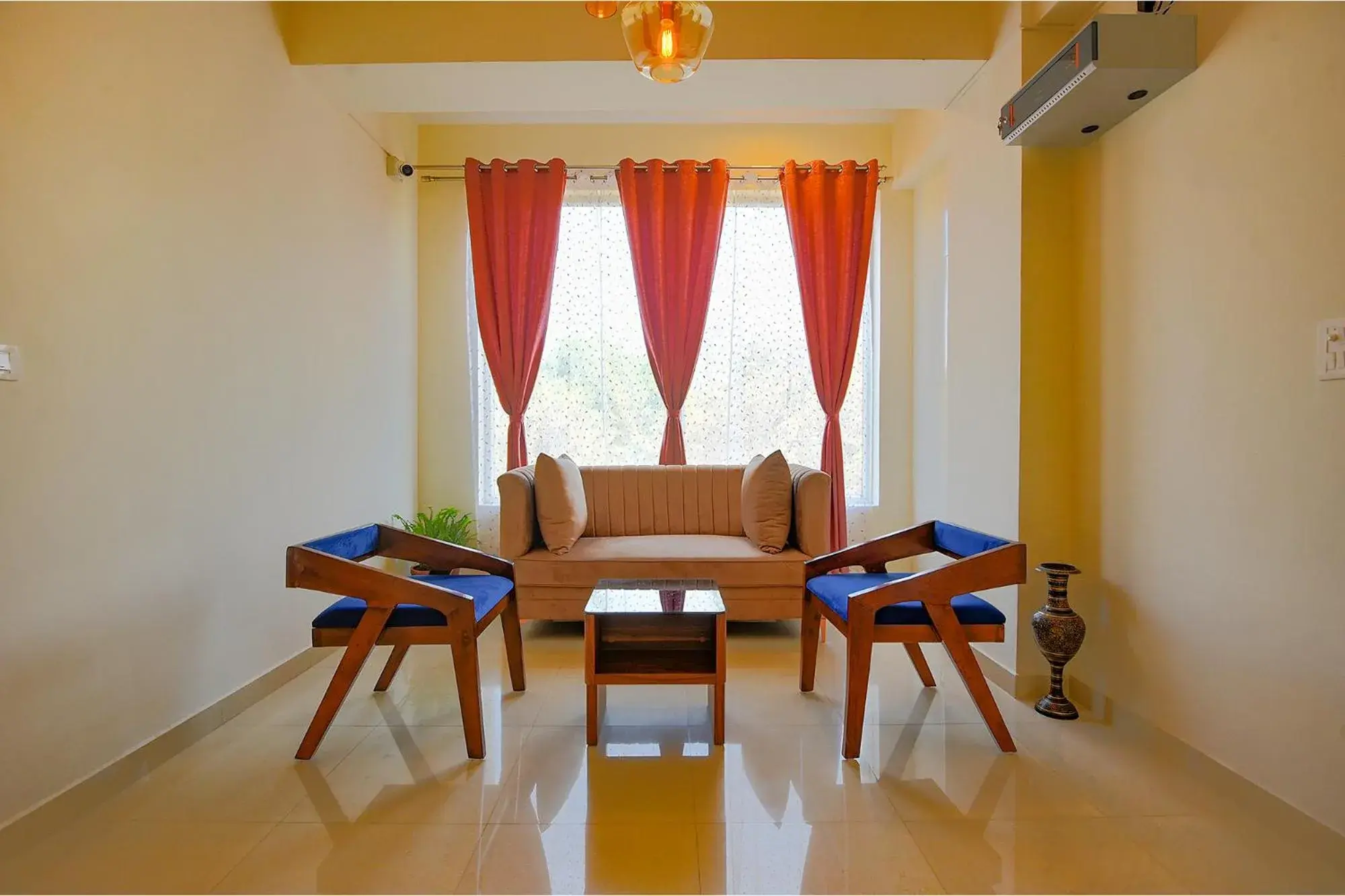 Seating area in FabHotel GR Lake View - BTM Layout Seating area in FabHotel GR Lake View - BTM Layout