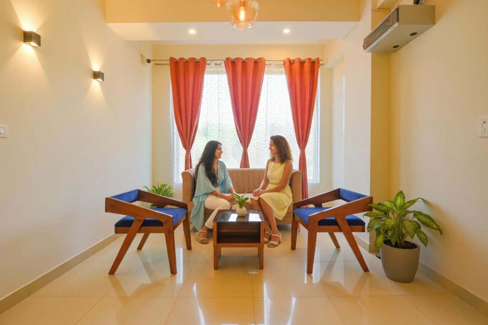 Seating area in FabHotel GR Lake View - BTM Layout Seating area in FabHotel GR Lake View - BTM Layout