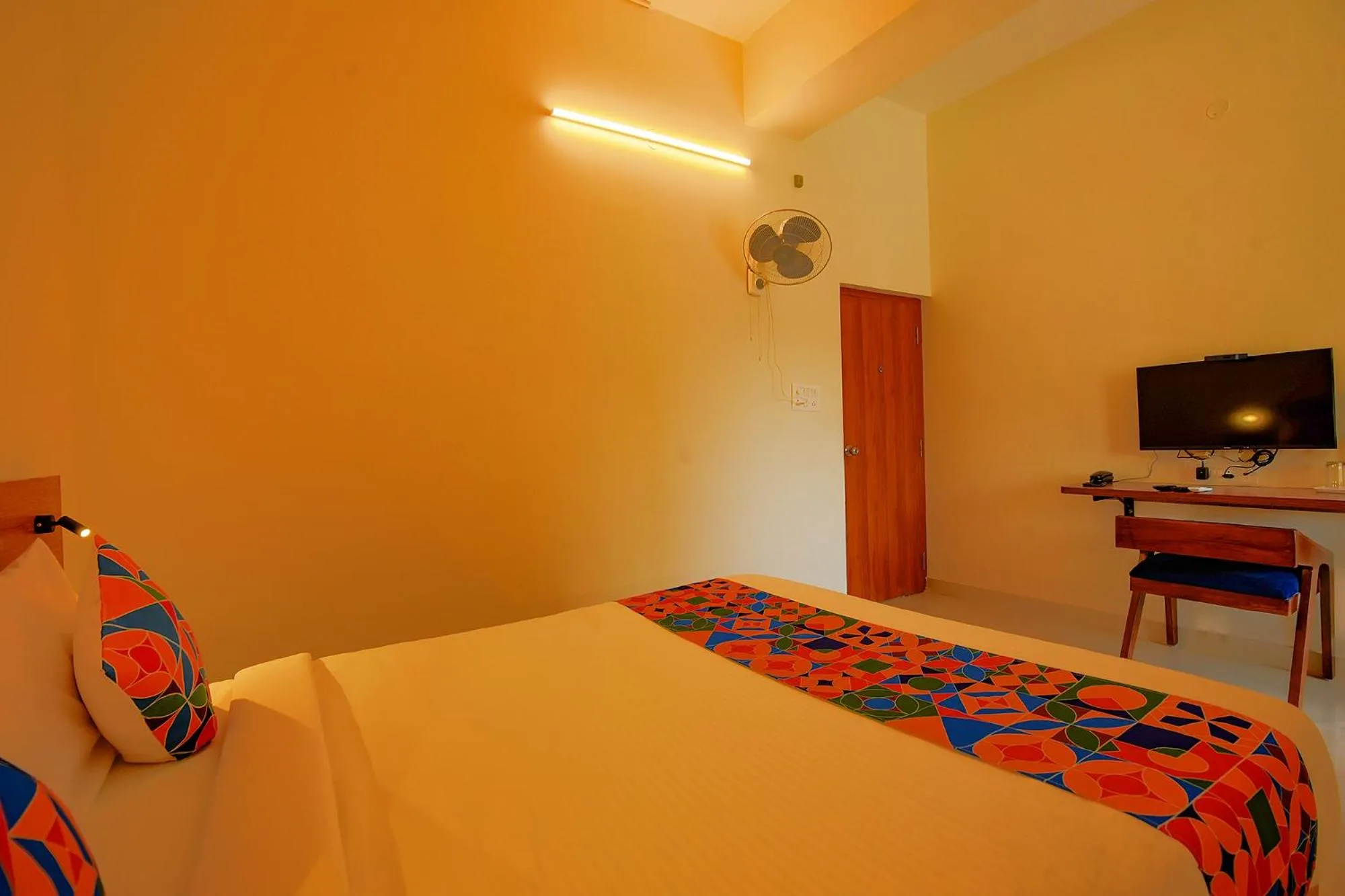 Communal lounge/ TV room, Bed in FabHotel GR Lake View - BTM Layout