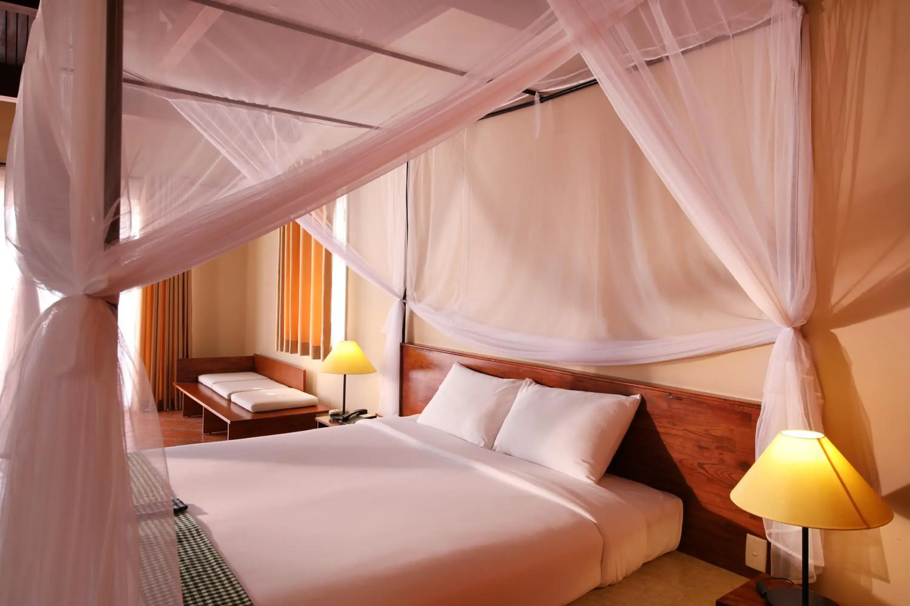 Bed in Victoria Nui Sam Lodge Bed in Victoria Nui Sam Lodge