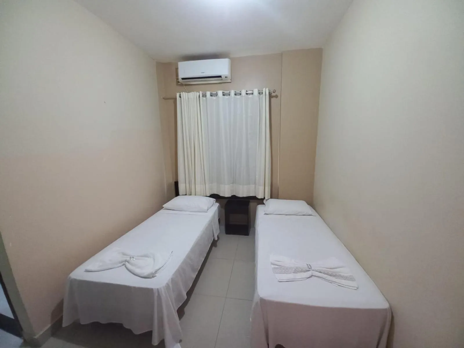 Bed in Serra's Palace Hotel