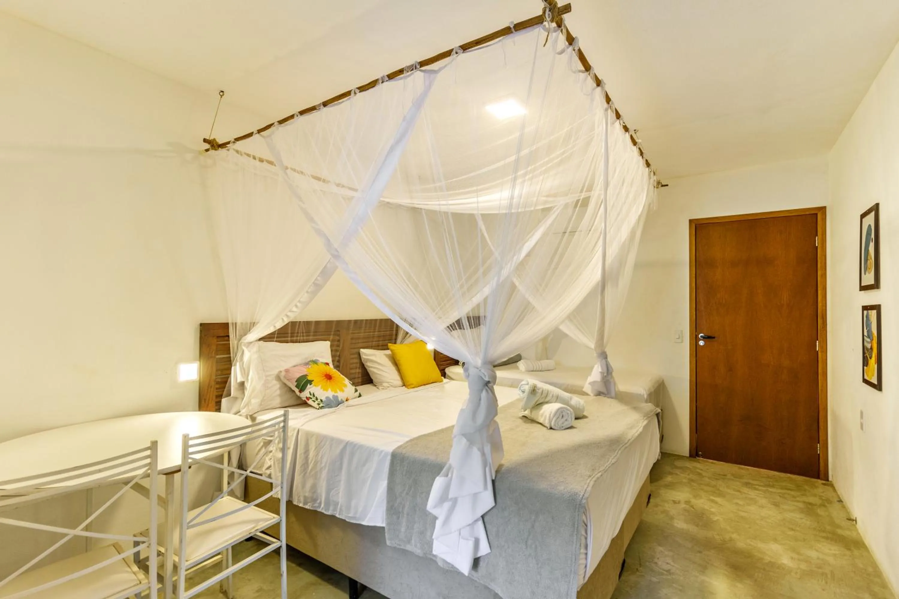 Bed in Pousada Imperador do Espelho