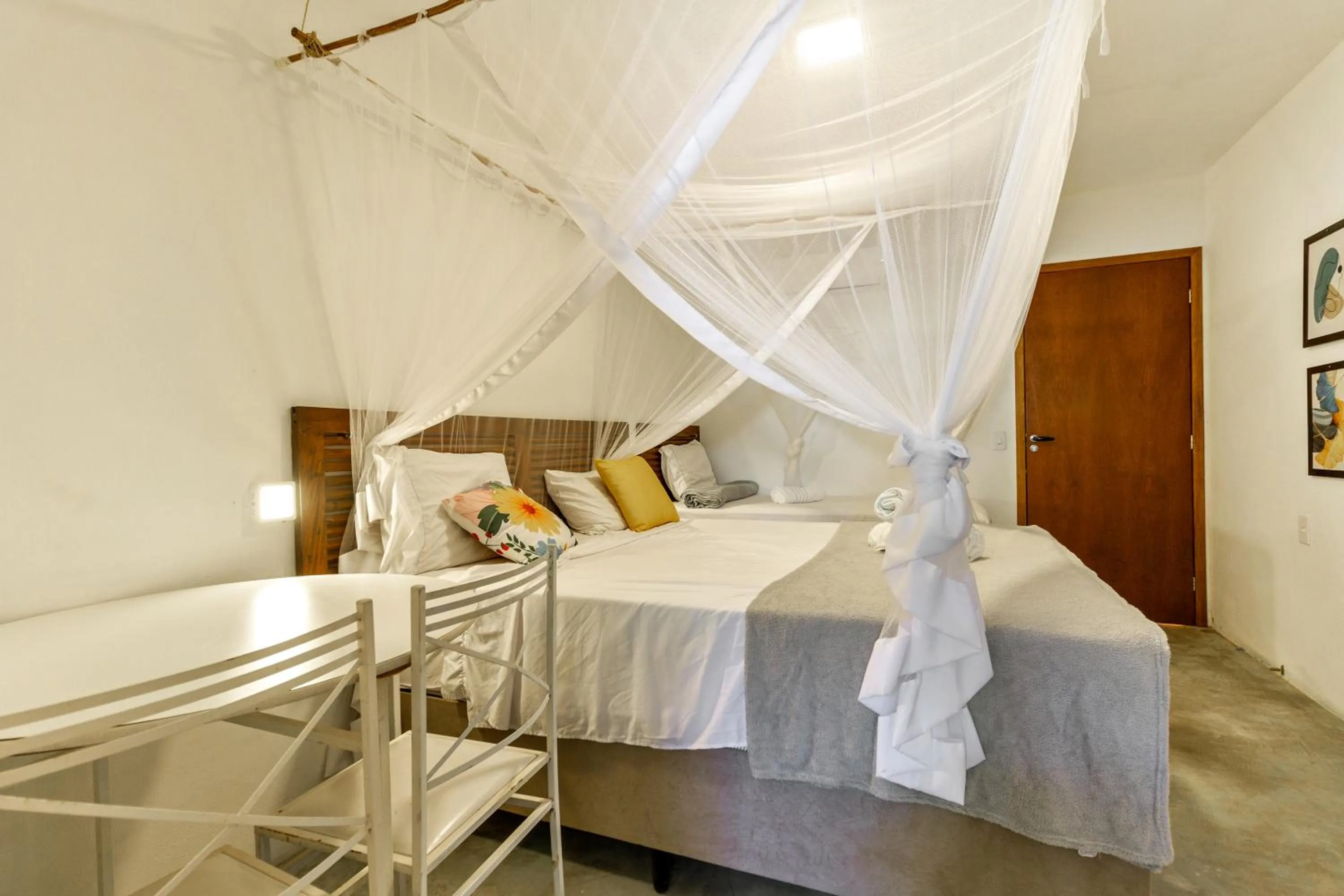 Bed in Pousada Imperador do Espelho