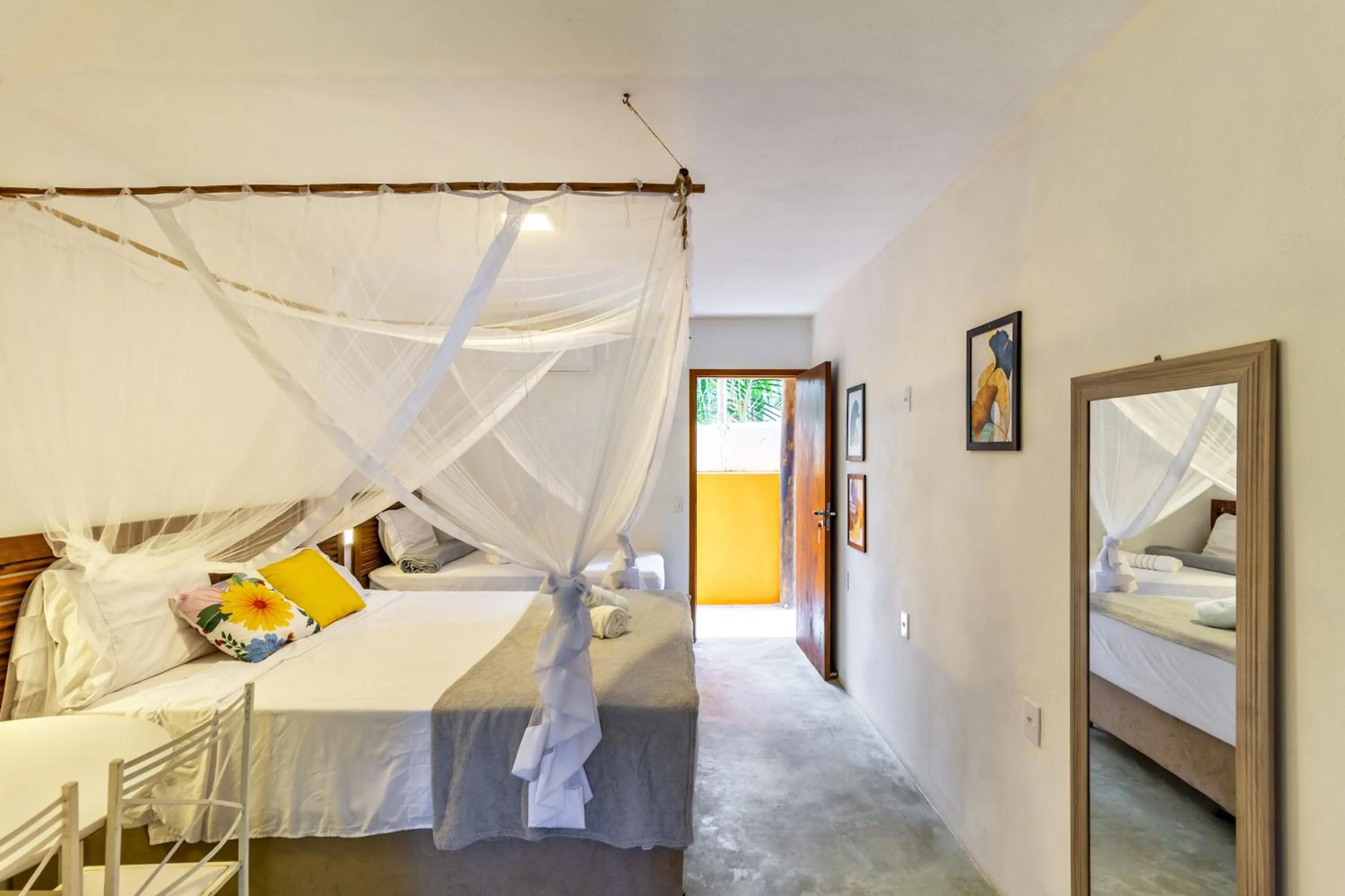 Bed in Pousada Imperador do Espelho