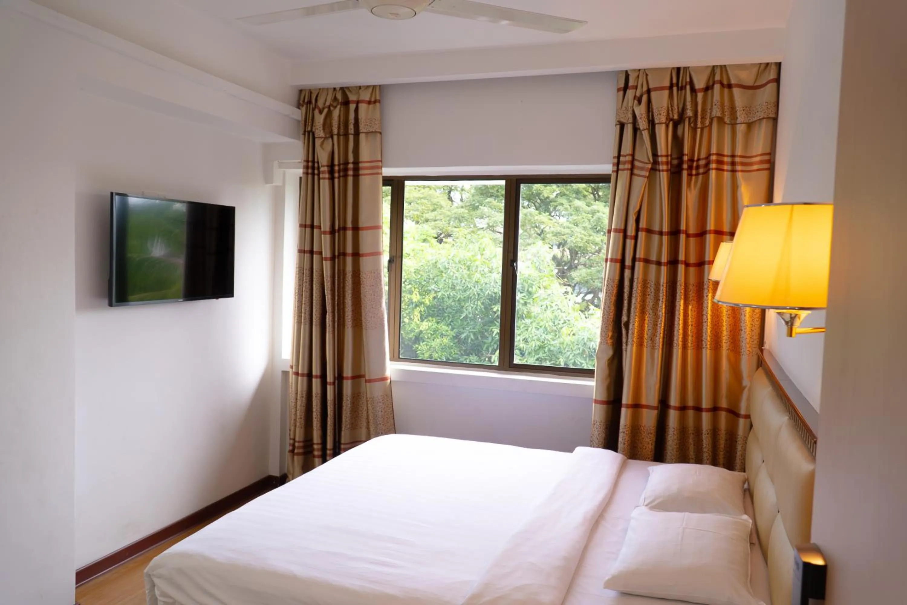 Bed in Borneo Suites Hotel