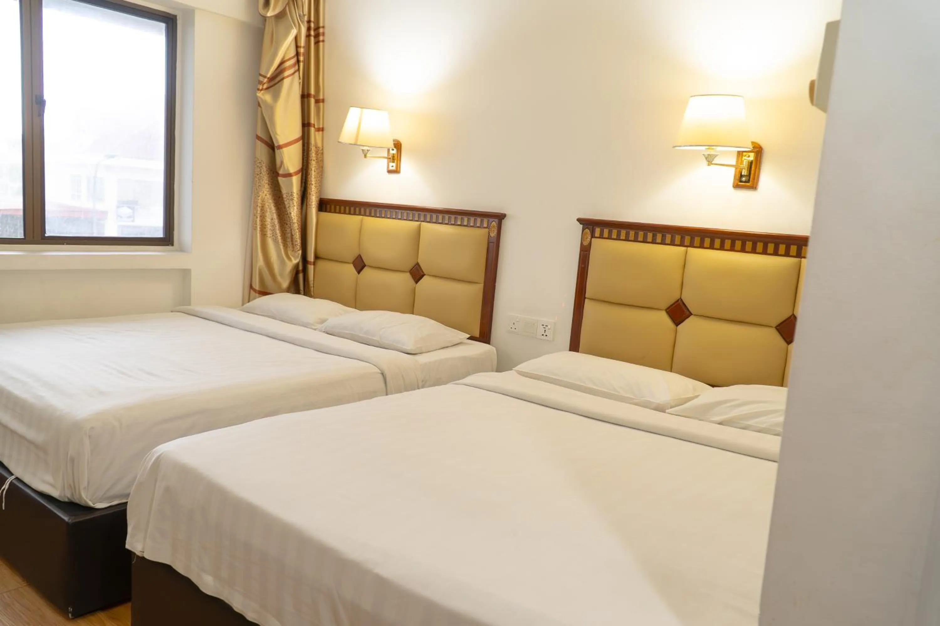 Bed in Borneo Suites Hotel