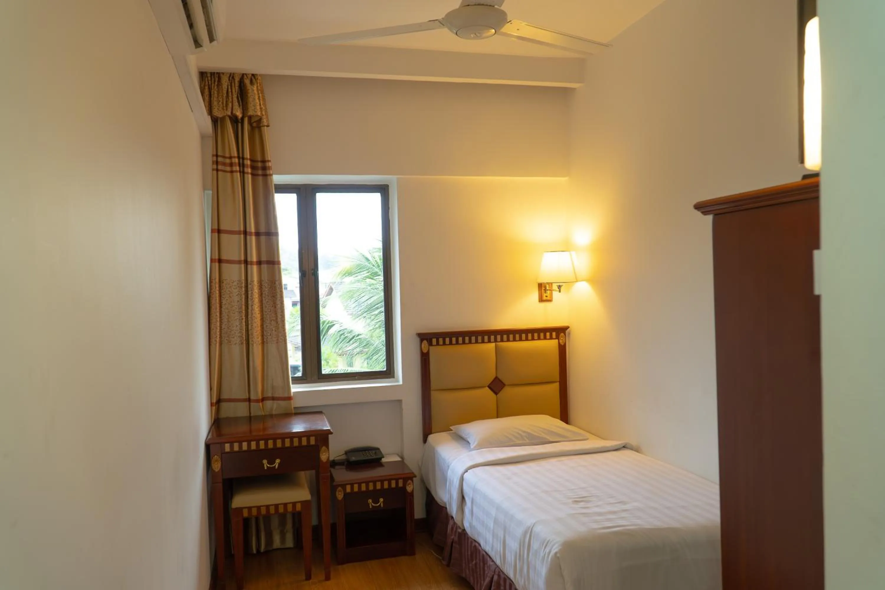 Bed in Borneo Suites Hotel