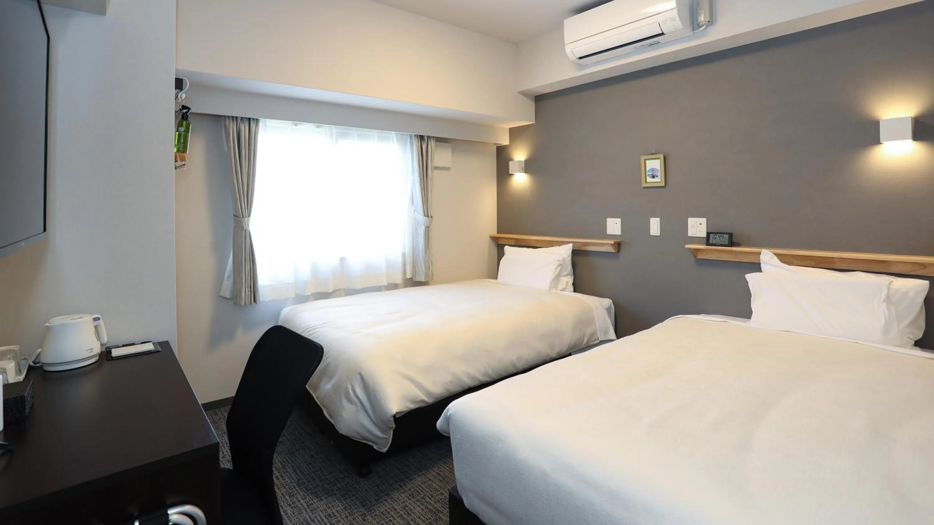 Bed in Station Hotel Nagasaki Suwa