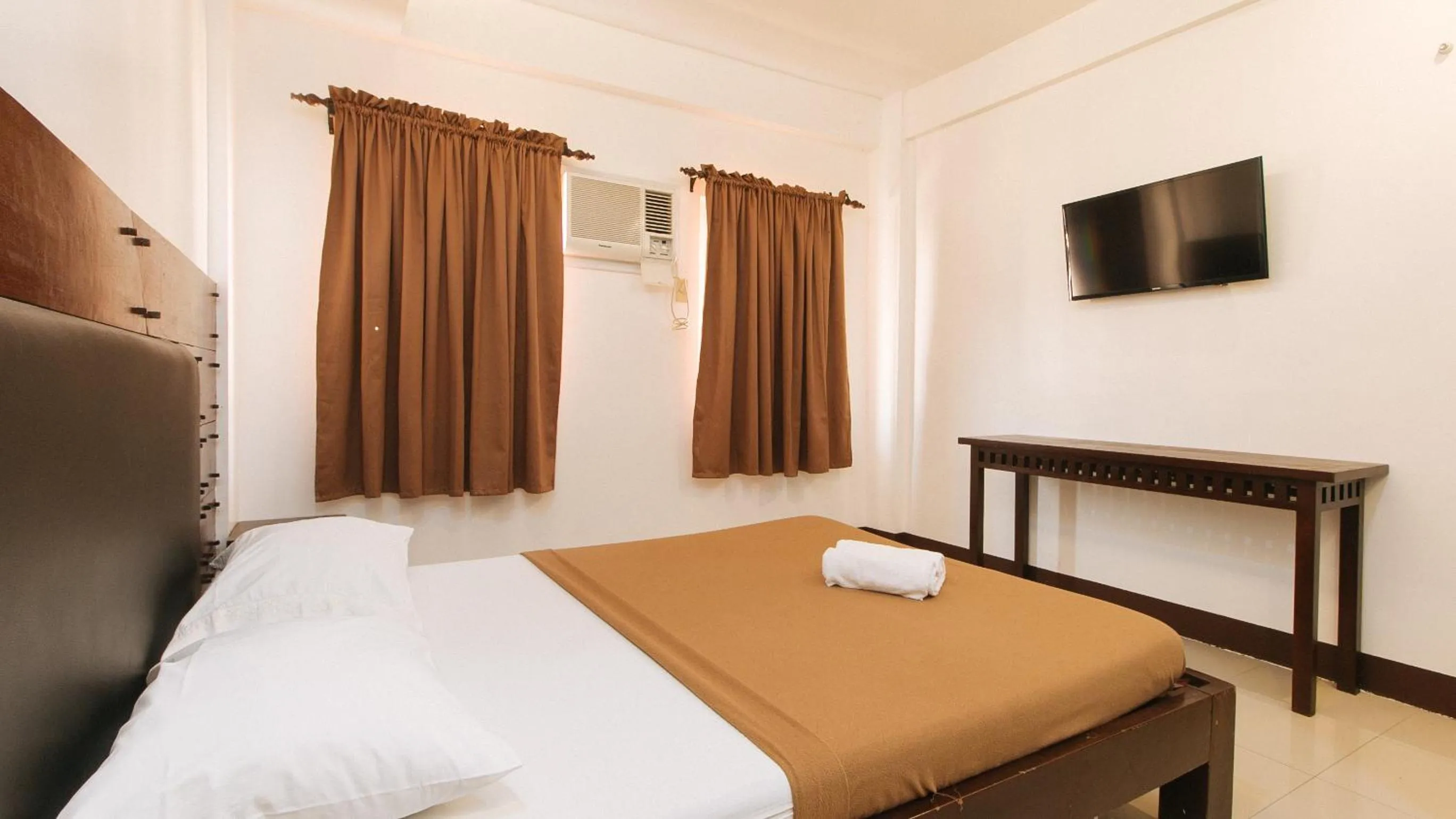 Bed in WestCourt Inn Ilocos Sur