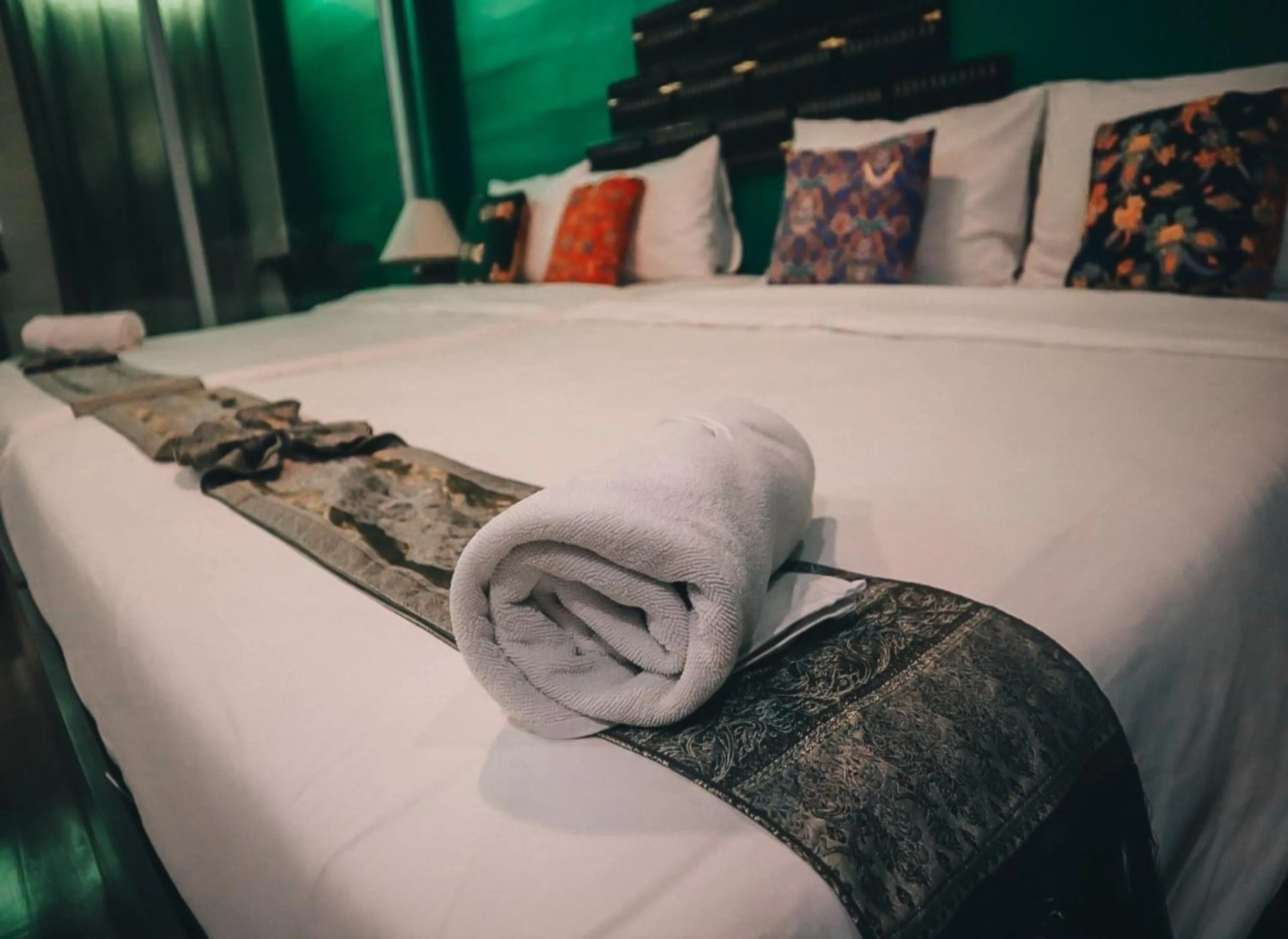 Bed in Thaweesuk Heritage Homestay