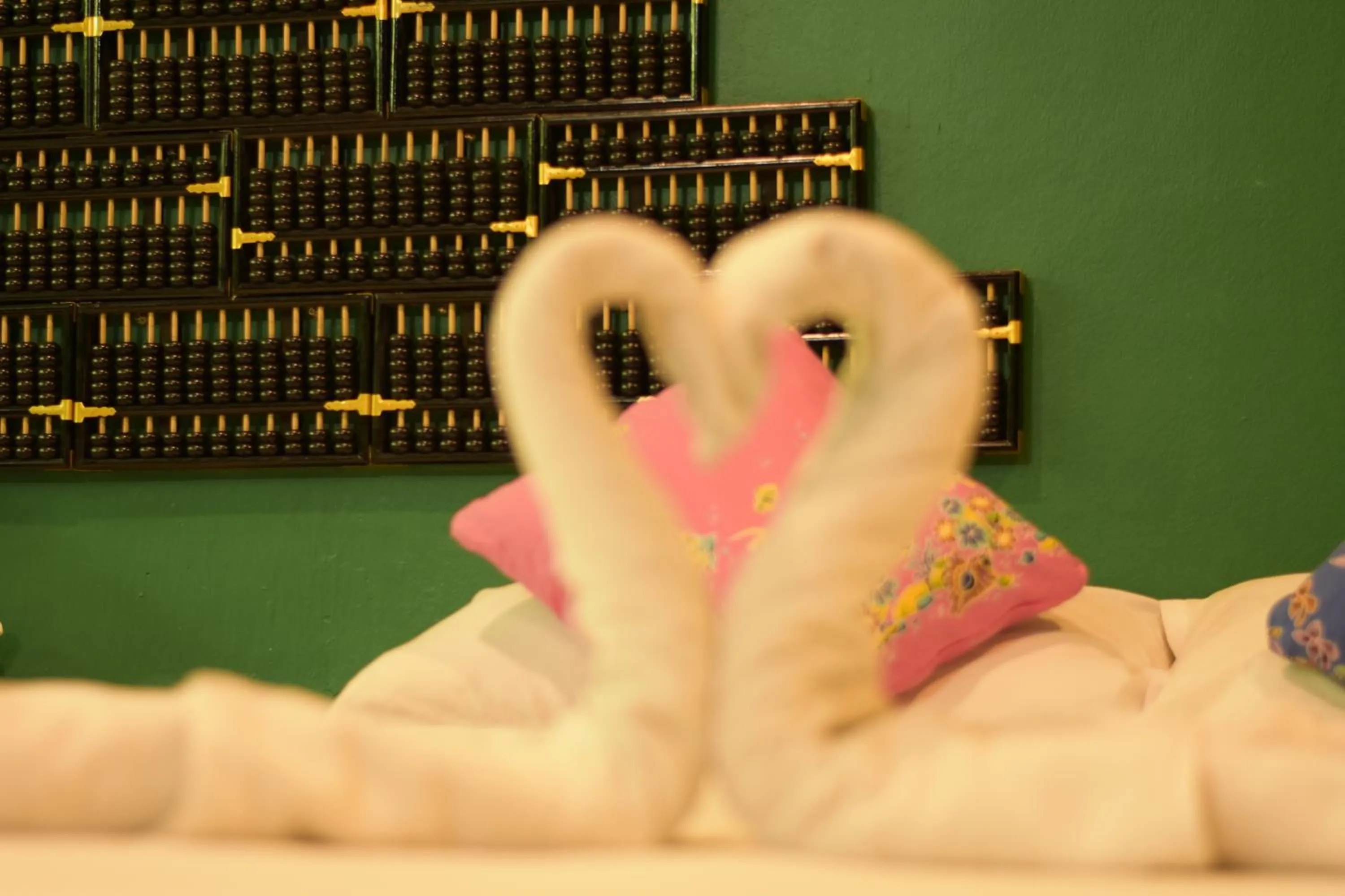 Bed in Thaweesuk Heritage Homestay