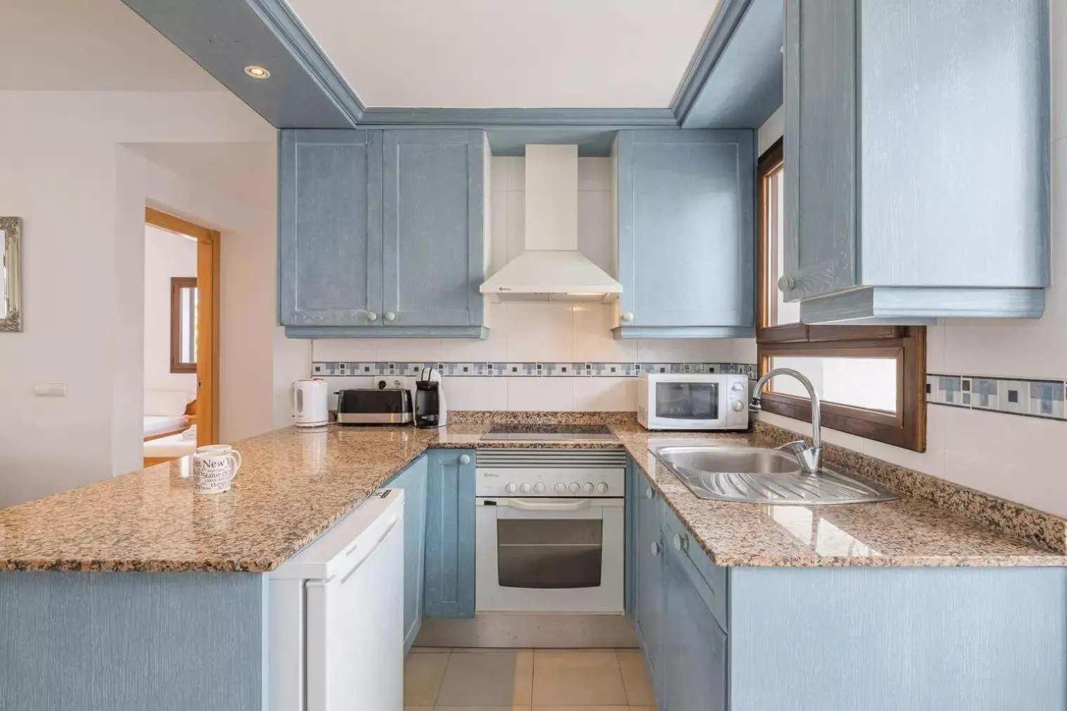 Kitchen or kitchenette in LA PERLA DE CALA DOR