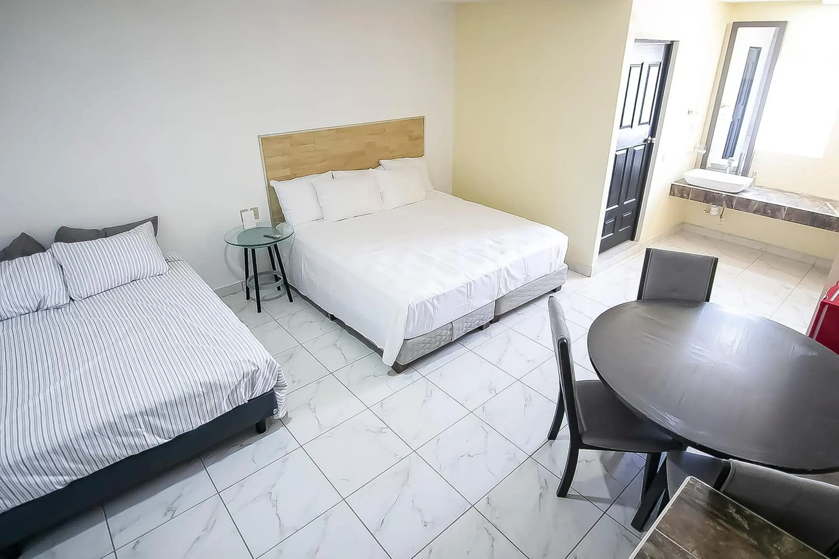 Bedroom, Bed in OYO Hotel Plaza Las Torres, Cabo San Lucas Bedroom, Bed in OYO Hotel Plaza Las Torres, Cabo San Lucas