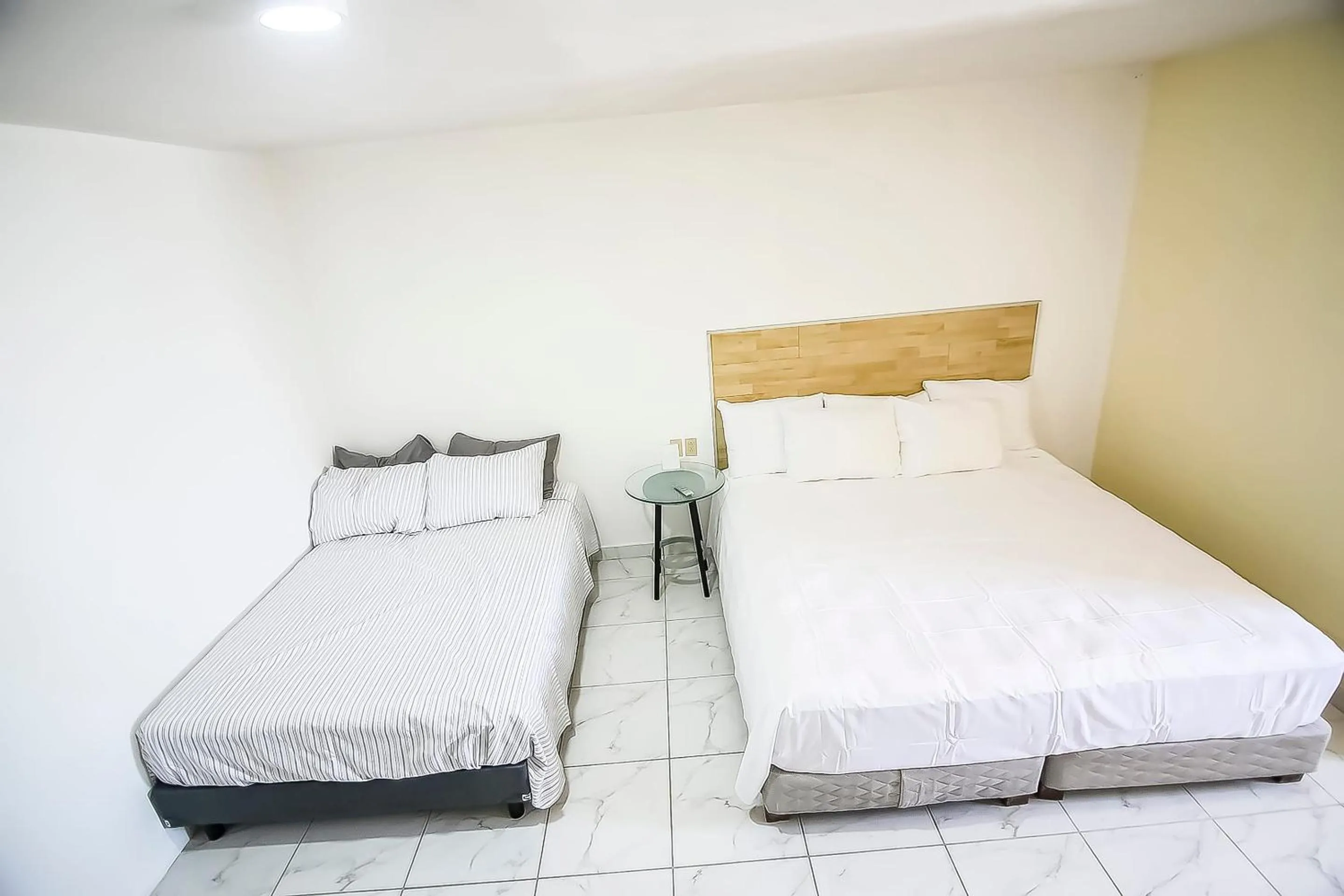 Bedroom, Bed in OYO Hotel Plaza Las Torres, Cabo San Lucas