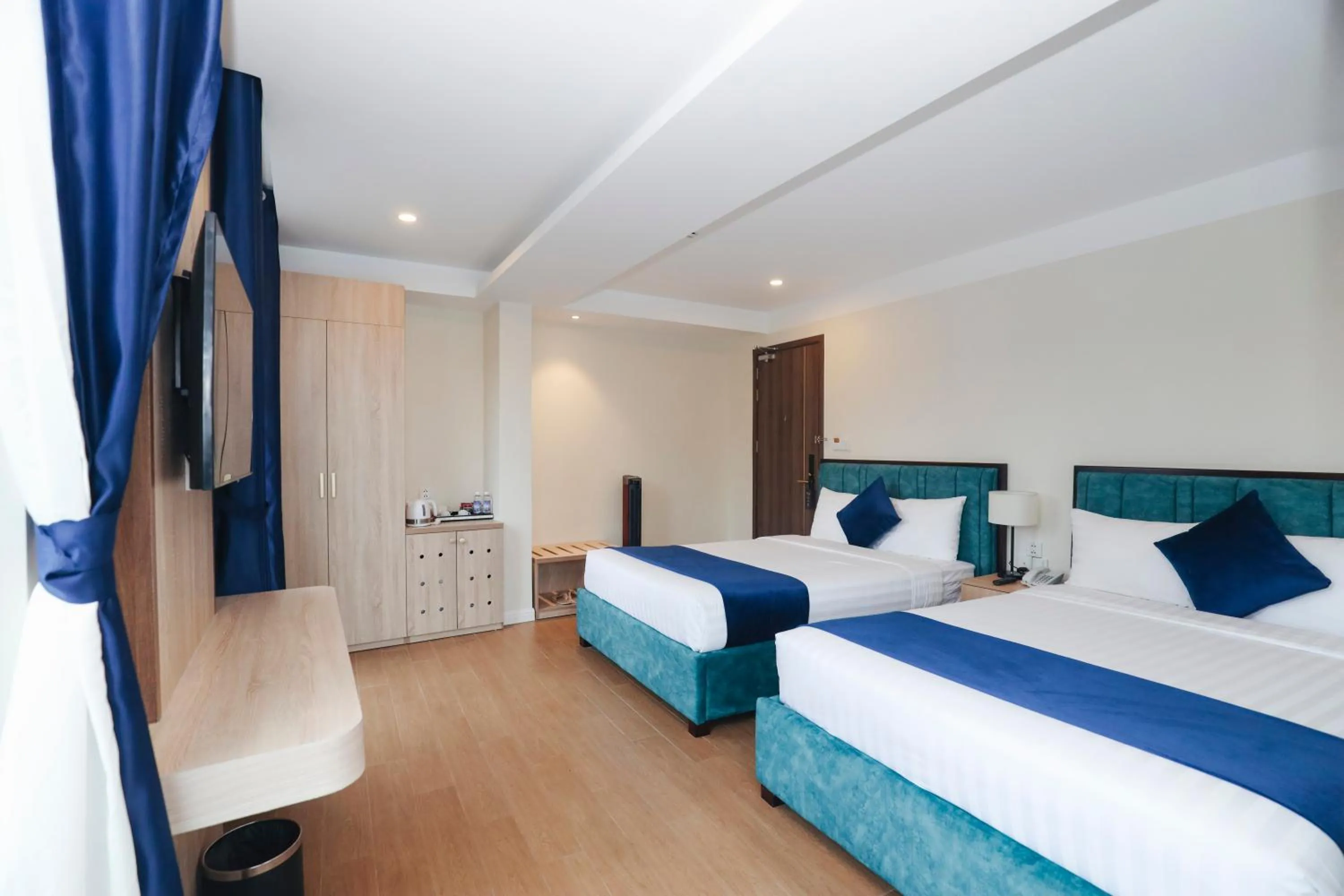 Bed in SANDALS FLORA HOTEL