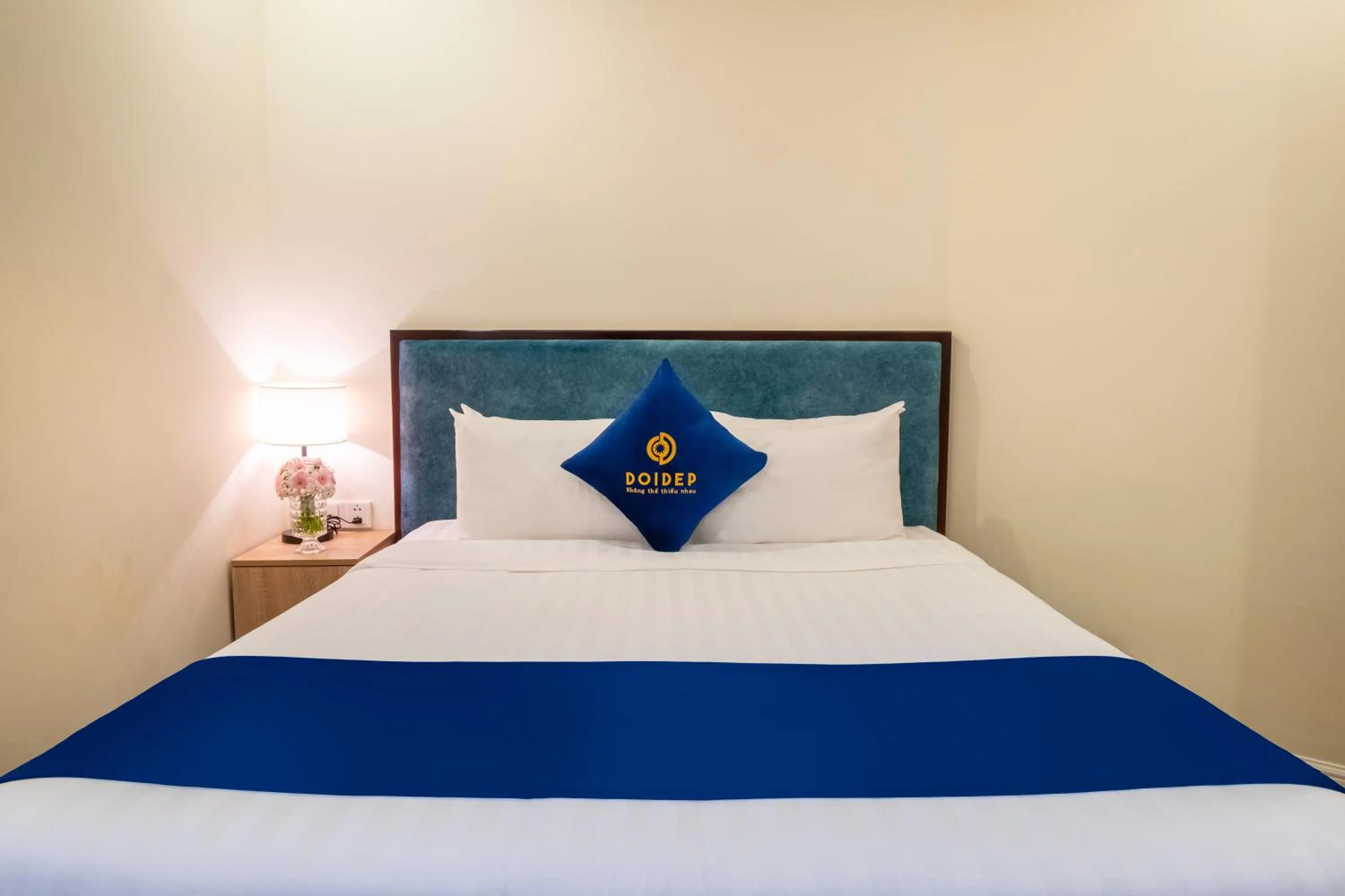 Bed in SANDALS FLORA HOTEL