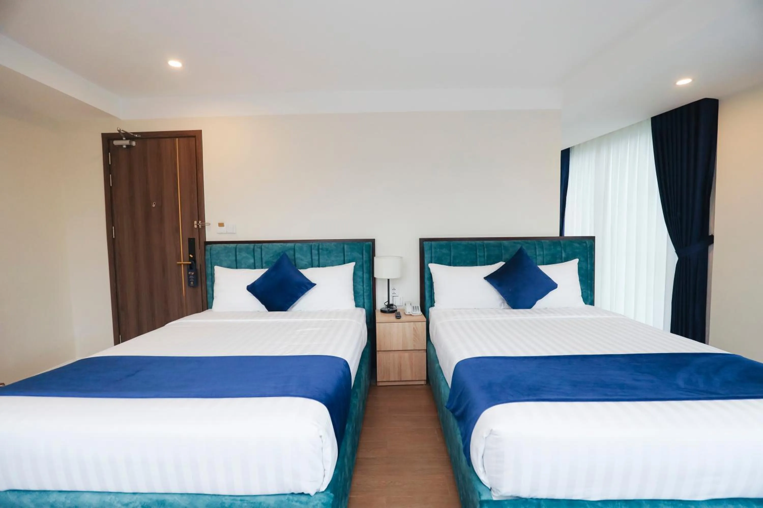 Bed in SANDALS FLORA HOTEL