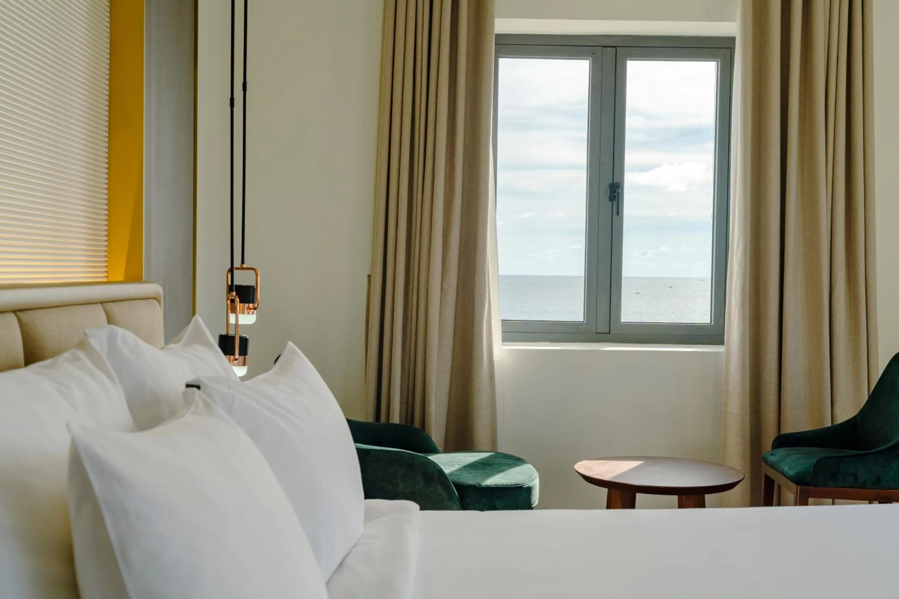 Seating area, Bed in The Tahiti Beach Hotel