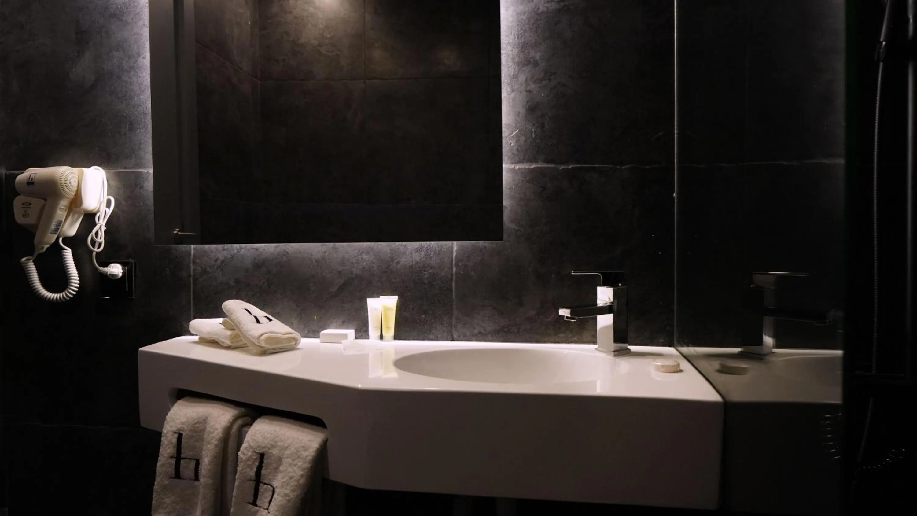 Bathroom in Aitch Boutique Hotel - an LIH Hotel