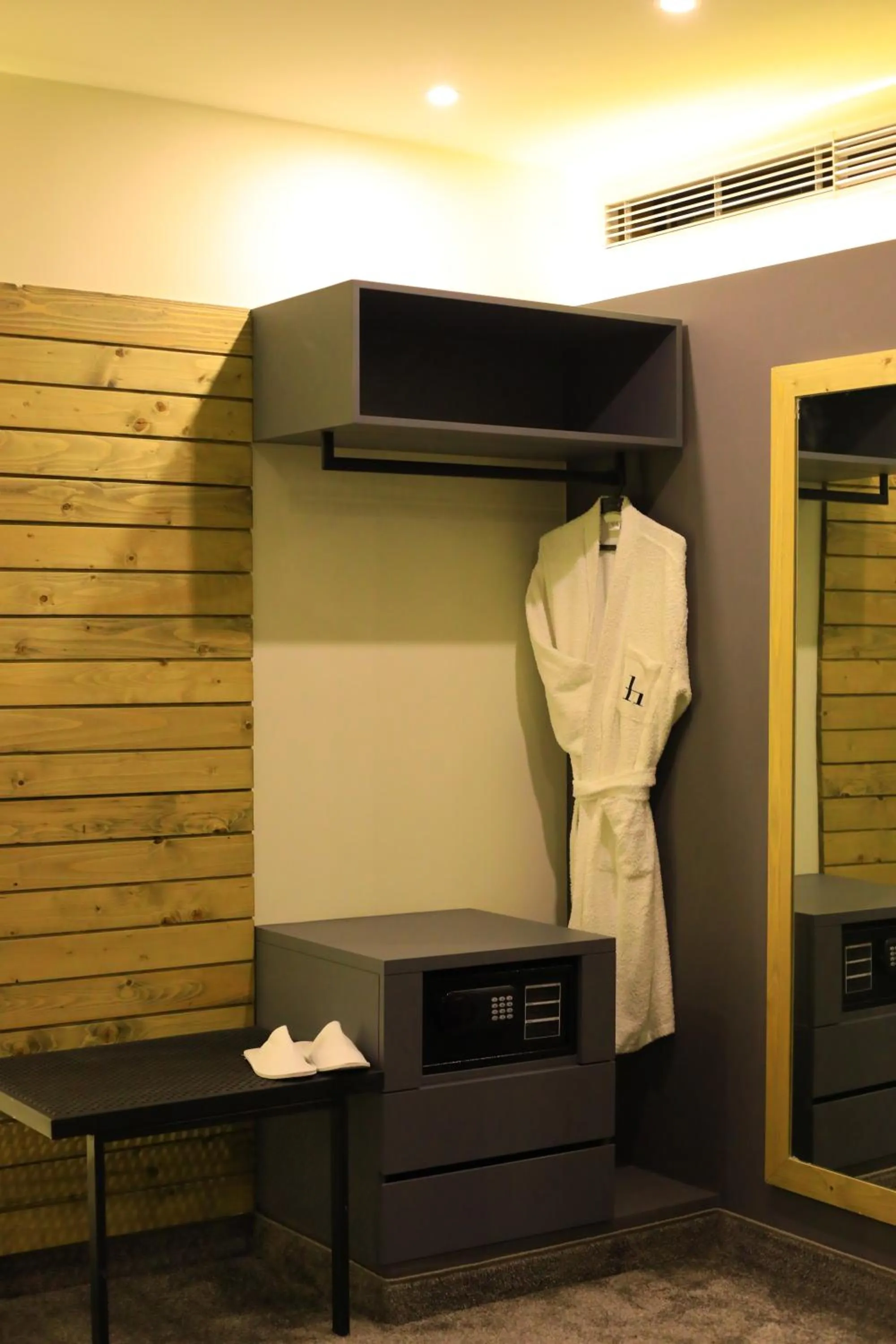 Communal lounge/ TV room in Aitch Boutique Hotel - an LIH Hotel