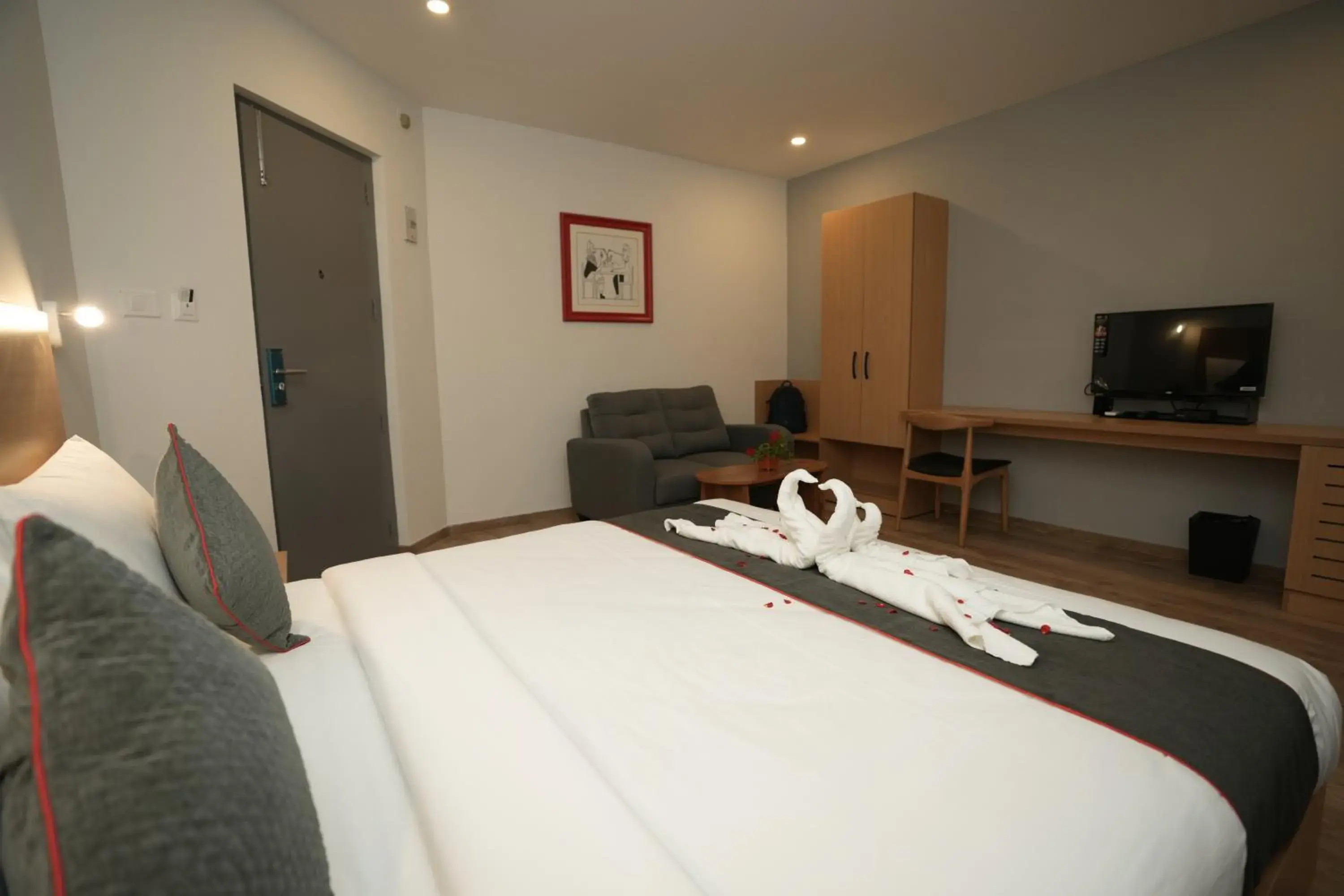 Communal lounge/ TV room, Bed in GRAND GANPAT Communal lounge/ TV room, Bed in GRAND GANPAT