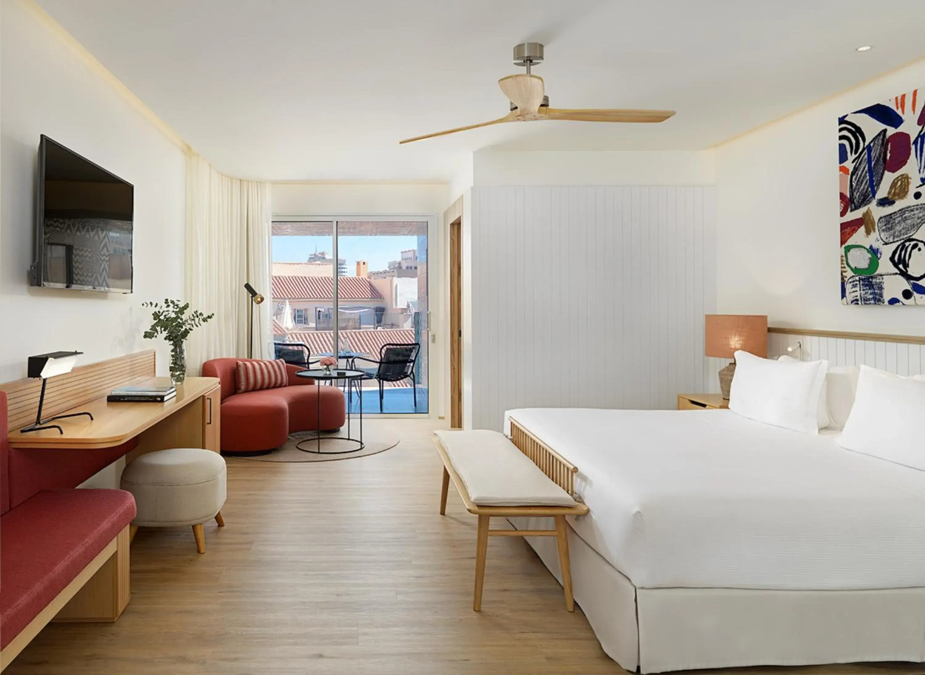 Living room, Bed in H10 Croma Málaga Living room, Bed in H10 Croma Málaga